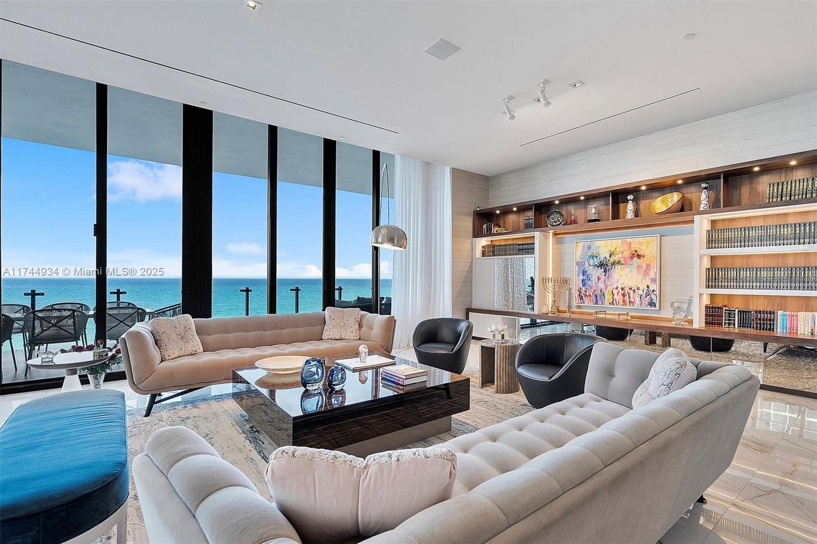 Experience the epitome of luxury living in this stunning 3-bedroom, 3.5-bathroom residence at The Muse in Sunny Isles Beach. Designed by SarahZ Designs, this exceptional home boasts breathtaking ocean views, soaring 12FT ceilings, and a selection of bespoke finishes, including custom wall units, Phillip Jeffries wall coverings, and Italkraft cabinetry. Enjoy a gourmet kosher kitchen equipped with top-of-the-line appliances, dual dishwashers, and a wine cooler. Step out onto the expansive 60-foot long balcony, featuring a built-in BBQ—ideal for hosting guests. Residents enjoy a range of five-star amenities, including beach and pool services, a fitness center, a spa, and an owners' lounge and restaurant. Includes 3 Parking spaces and 1 Storage Unit.