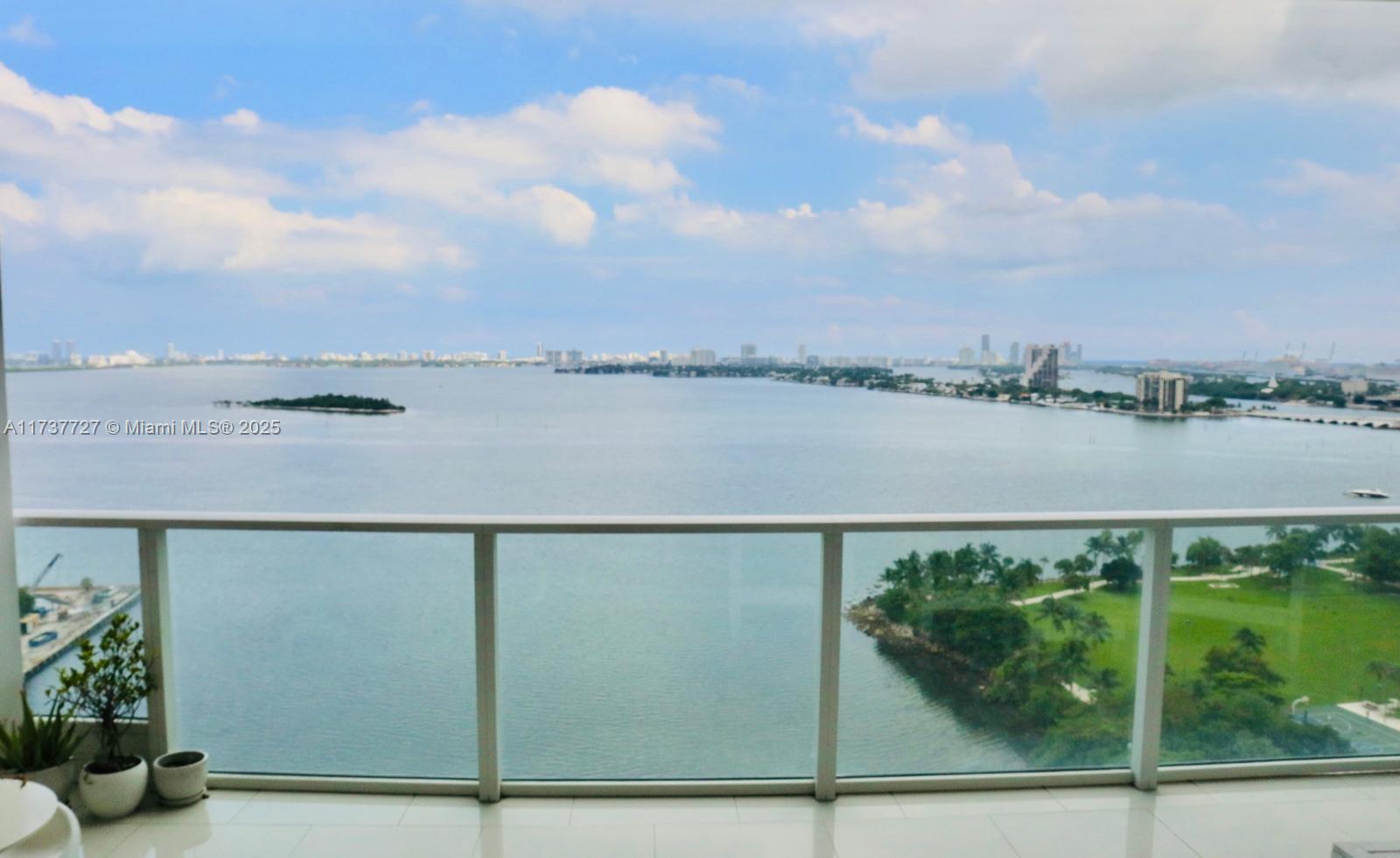 Beautiful two bedrooms and two bathrooms with amazing bay view from the living room and master bedroom. This building is like a resort with top amenities, including a heated infinity-edge swimming pool, heated sunset swimming pool, his an hers sauna and steam room, movie theater clubroom with a fully equipped kitchen and big-unscreen TV, billiard table, fitness center, spa with massage room, children's playroom, teen game room with arcade, concierge and valet parking. The building was designed by Lenny Kravitz. This unit has a private elevator, private foyer, 10 foot-high ceilings with floor to ceiling glass windows, an 8 foot-deep balcony with glass railing, in unit washer and dryer and top of the line kitchen appliances. Located in Edgewater.