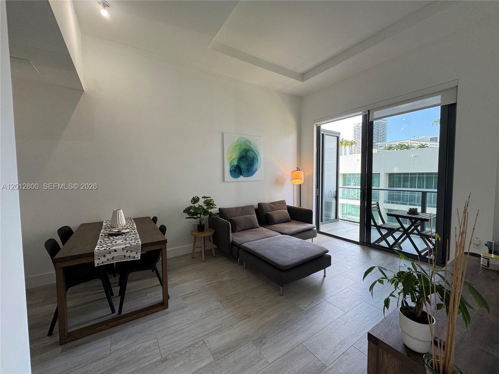 Discover elevated living in this fully furnished 1-bedroom condo at Hyde Midtown. This bright and modern
residence offers 607 sq. ft. of open-concept living, complete with high-end finishes, tile flooring, floor-to-ceiling
impact windows, and city views from a private balcony. The kitchen features top-of-the-line appliances and sleek
cabinetry, while the bedroom includes blackout shades and a workspace ideal for remote professionals. Hyde
Midtown offers an impressive array of resort-style amenities: infinity-edge pool, spa, tennis court, putting green,
fitness center, media room, business lounge, and more. Perfectly located just steps from the Design District,
Wynwood, dining, shopping, and entertainment.