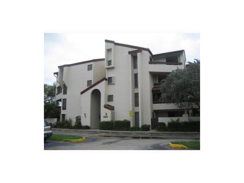 Enjoy this spacious unit, ready to move in. Great Condition with ceramic tile throughout, features includes large washer and dryer, front courtyard entry with elevator and stairs, in front of a great open parking lot. Close to Shopping, Turnpike and more.  Great Area.