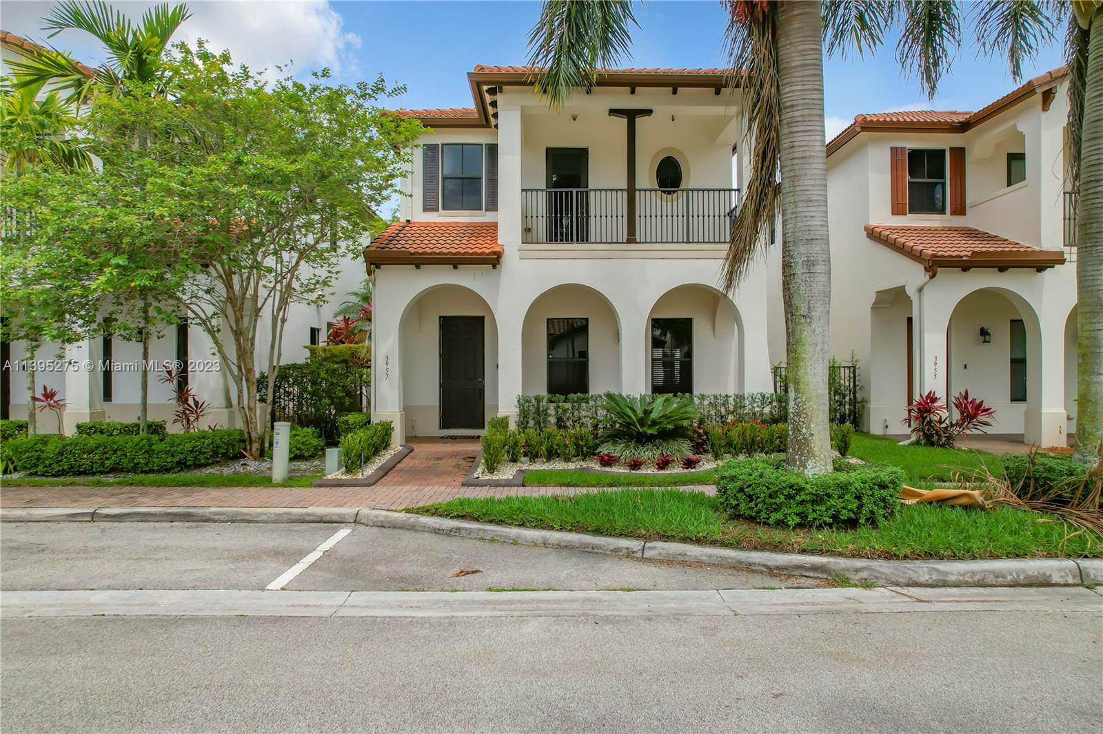 Beautiful open and airy 3 Bedroom 2 1/2 Bath Laguna model in the safe, secure and family-friendly Moneterra gated community. This ready to move-in home features impact windows and doors upstairs. Enjoy cool evenings relaxing on your second floor tiled balcony just off the master bedroom. Custom built in breakfast nook with seating and additional storage right off the kitchen is both architecturally beautiful and functional. Gourmet kitchen includes stainless steel appliances, large 42" dark wood cabinets with built-in's galore, beautiful granite counter tops and illuminated by  restoration hardware lighting.All bedrooms feature closets with finished built-in closets. Master suite includes walk-in closet with built-ins and the large glass shower enclosure and sunken tub. This is a must see!