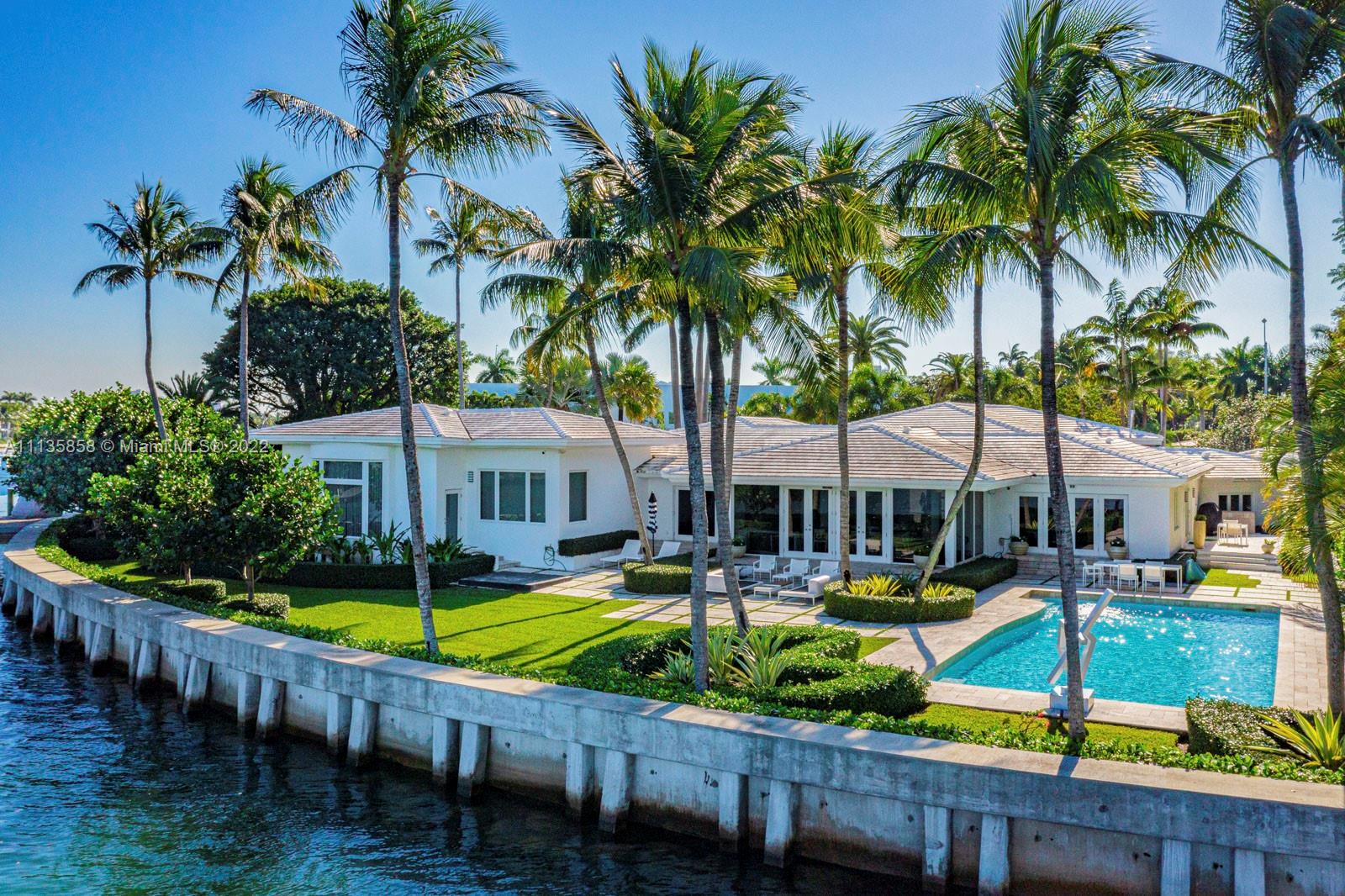 Contemporary one story estate, recently renovated to perfection, encompasses 6,096 SF of living space & sits
on an expansive 31,890 SF lot. This truly magnificent home offers a grand entrance, stunning water views, an
impressive 250 WF, a sprawling pool, beautiful lushly landscaped outdoors perfect for entertaining. Ample
driveway & setback entry lead to stunning 5BD,5+1BA home w/gourmet kitchen w/ top of the line appliances,
mesmerizing outdoor views from every room, natural light, expansive 12FT ceiling master bedroom & a 3 car
garage. Live a life of sophistication and relaxation in this impeccable waterfront estate.