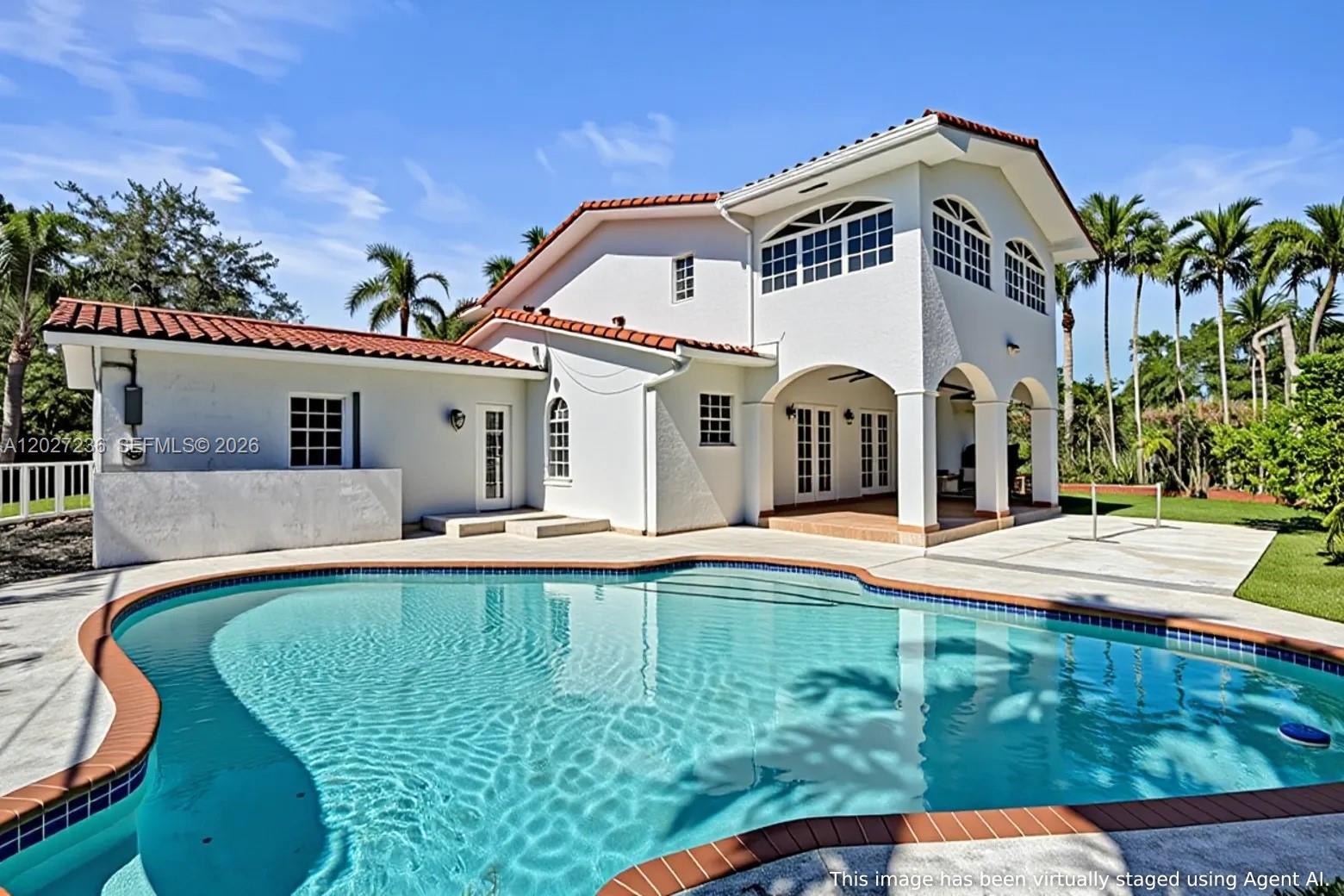 Beautifully remodeled two-story Coral Gables pool home on a 10,000 sq ft lot, offering 5 bedrooms and 3.5 baths with timeless finishes and excellent indoor-outdoor living. The living room features soaring ceilings and abundant natural light, creating an airy, inviting space. The Italian-designed Veneta Cucina kitchen is the centerpiece, featuring Quartzite countertops and a premium appliance package including JennAir (refrigerator, electric range, microwave, dishwasher) plus a Viking wine chiller and ice maker. Flooring includes travertine throughout, with laminate wood in the primary bedroom and two additional bedrooms.

Enjoy the convenience of a 2-car garage with an LG stackable washer and dryer plus an additional Sub-Zero refrigerator for extra storage. Step outside to a lushly landscaped backyard with a sparkling pool and generous patio areas, ideal for relaxing or entertaining. Prime Coral Gables location close to top schools, dining, and shopping. Pool and lawn maintenance are included in the rent.