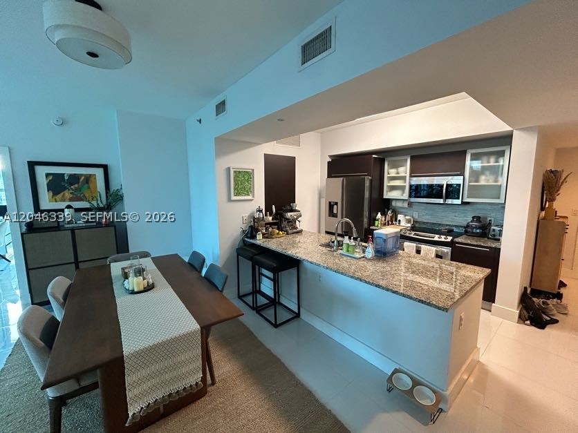 THE PLAZA 901 BRICKELL CO - Residential Lease