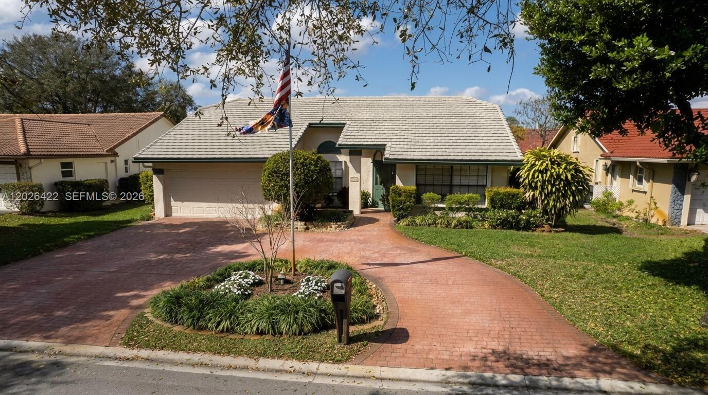 Move-in ready 3-bedroom, 2-bath, 2 car garage home in the heart of Coral Springs!
Renovated kitchen features wood cabinets, quartz countertops/backsplash and
stainless-steel appliances. New 2026 Washer and Dryer, new 2026 Range, newer dishwasher, microwave, A/C,
water heater, Knockdown ceilings and plantation shutters. The house and primary suite boasts
vaulted ceilings, custom walk-in closet, free-standing tub and separate shower room.
Both bathrooms renovated with new floating vanities, ceramic tile, and upgraded
fixtures. Accordion shutters throughout, screened in patio and a spacious deck with a
BBQ grill. Mature landscaping, fence-in backyard, and a circular driveway. Can be sold
with or without furniture. Conveniently located near “The Walk” and minutes away from
dining, shopping, and more.