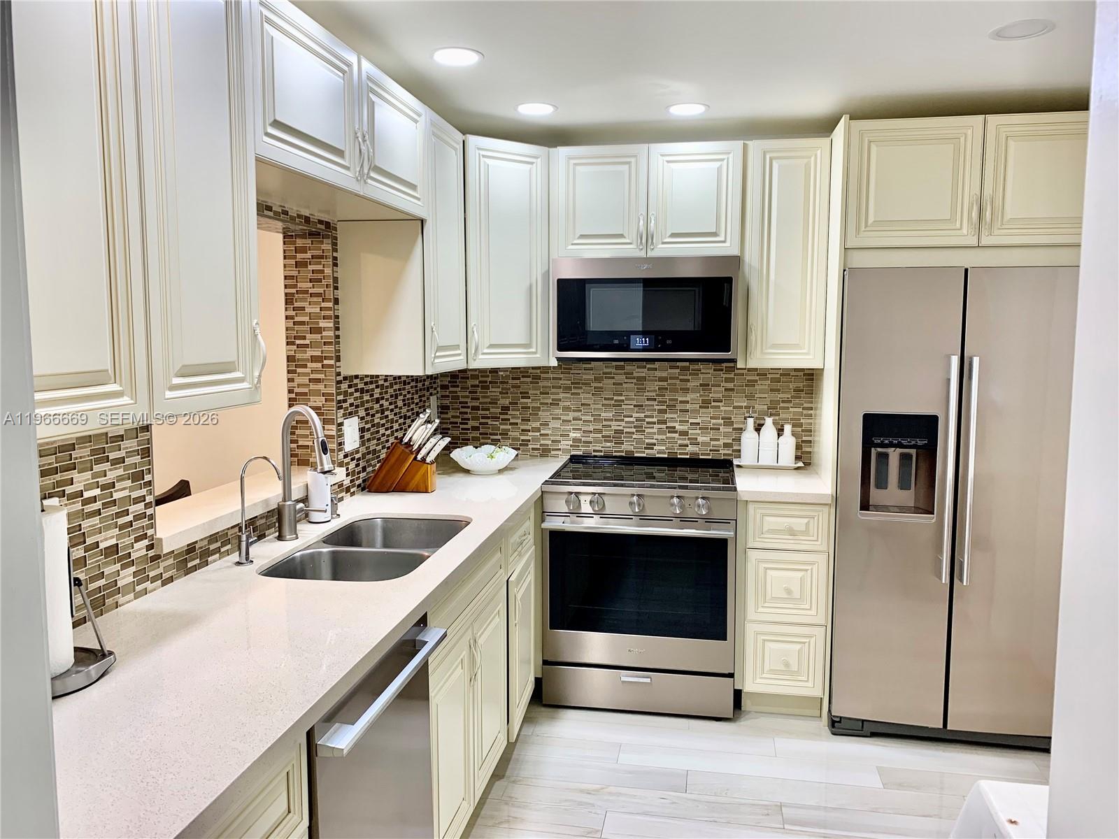 Beautifully updated 2-bedroom, 2-bath residence offering comfort, style, and peace of mind, featuring a fully upgraded kitchen and bathrooms, along with Modernised Bedrooms enhanced by recessed spot lighting. Enjoy additional living space in the Enclosed Balcony, perfect for relaxing or entertaining year-round. The property is equipped with hurricane impact windows, and the building has successfully passed its inspection and recertification, including a new roof and fresh exterior paint, ensuring long-term value and security. Residents enjoy Amenities such as a Heated Pool, clubhouse with exercise room, and sauna. Conveniently located steps from grocery stores and shopping plazas, and surrounded by a wide variety of restaurants. Just minutes from the casino and the world-renowned Aventura Mall, offering premier shopping, dining, and entertainment. A perfect combination of location, upgrades, and lifestyle