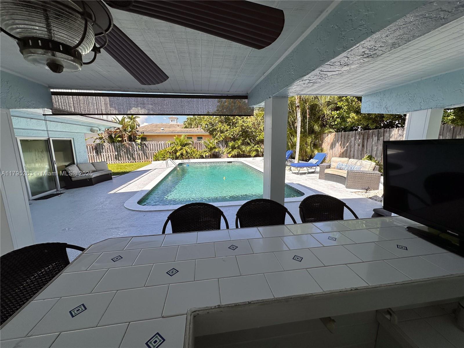 Discover exclusive Hillsboro Shores with this exceptional address offering private beach access just steps away. Entertain in style in your own tropical oasis, featuring a heated pool, hot tub, and Key West-style outdoor bar. Start each morning with stunning sunrises from the rooftop sundeck and retreat to the luxurious primary suite, boasting vaulted ceilings and a spa-inspired bathroom with a jetted tub overlooking the iconic Hillsboro Lighthouse. Thoughtfully updated for effortless indoor-outdoor living, this home blends comfort and elegance throughout. Ideally located just minutes from a private airport, championship golf and pickleball courts, top-rated restaurants, upscale shopping, and the vibrant Pompano Pier.  Live in paradise year round or launch the ultimate AirBnb retreat.