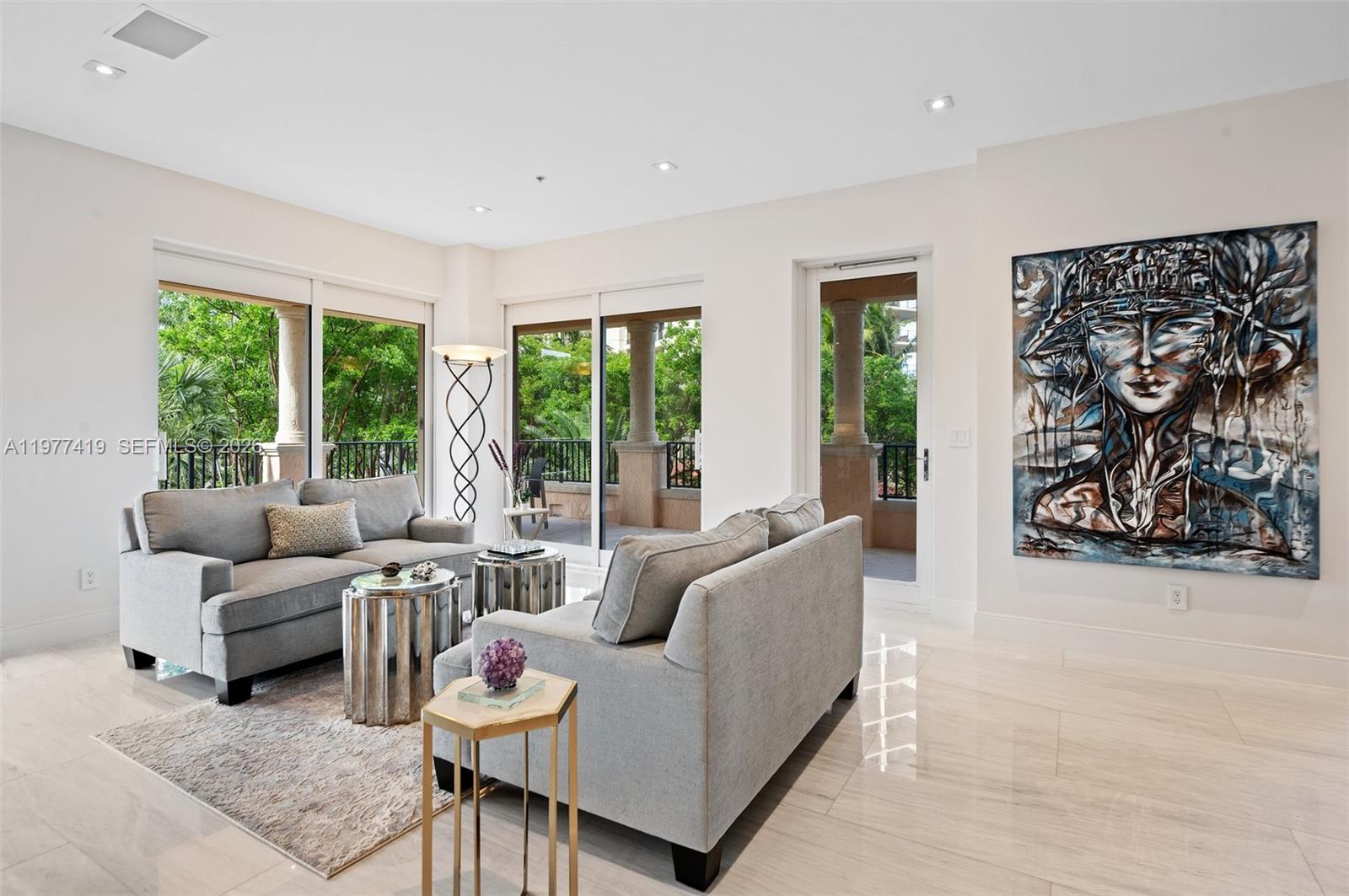 Welcome to refined living in the prestigious Deering Bay Yacht & Country Club. This beautifully remodeled 3 bedroom + den 3.5-bath residence in Padua building offers elegant interiors, generous living spaces, with beautiful bay views, and surrounding landscape. Enjoy a modern, open-concept layout with high-end finishes throughout, gourmet kitchen, spa-inspired bathrooms, and abundant natural light. The spacious primary suite feature a luxurious en-suite bath and custom walk-in closets. Padua is a fully funded building and Seller has paid all assessments, offering peace of mind and long-term value. Residents enjoy exclusive access to world-class amenities: golf course, tennis and pickleball courts, private marina, resort style pools, and fine dining-all within a secure, gated community.