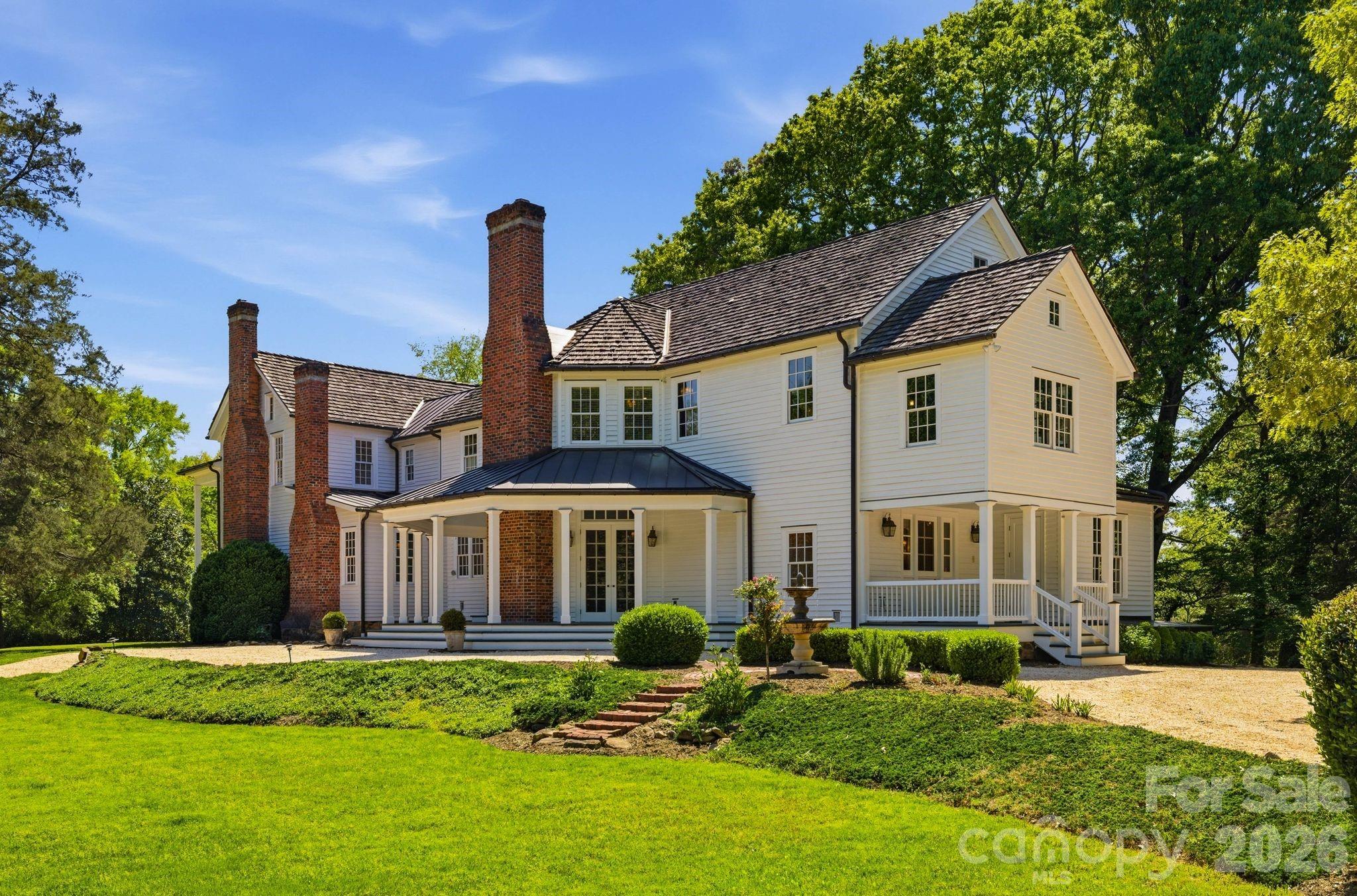 Welcome to one of Charlotte’s most extraordinary and storied residences, gracefully set on over 2.33 private acres in the heart of SouthPark. Originally dating back to the early 1800's, this iconic estate, known as The William Lee House, has been meticulously restored and reimagined to blend historic character with refined modern living.

Spanning approximately 7,400+ square feet, this 4-bedroom, 5.5+ bathroom estate offers a rare opportunity to own a true legacy property just minutes from Charlotte’s premier shopping, dining, and lifestyle amenities.

From the moment you arrive, the property exudes timeless elegance—surrounded by mature landscaping, expansive grounds, and unparalleled privacy. Inside, original architectural elements such as hand-hewn wood floors, historic fireplaces, and preserved millwork seamlessly coexist with thoughtful renovations and modern conveniences.

Designed for both grand-scale entertaining and intimate everyday living, the home features multiple living and gathering spaces, a chef’s kitchen, and exquisite detailing throughout. Rich textures, curated finishes, and an abundance of natural light create a warm yet sophisticated atmosphere across every room.

Outdoors, the estate transforms into a private retreat—complete with a resort-style pool, pool house, and expansive grounds ideal for entertaining, relaxing, or future customization.

This designated Charlotte historic landmark qualifies for a 50% tax credit.
