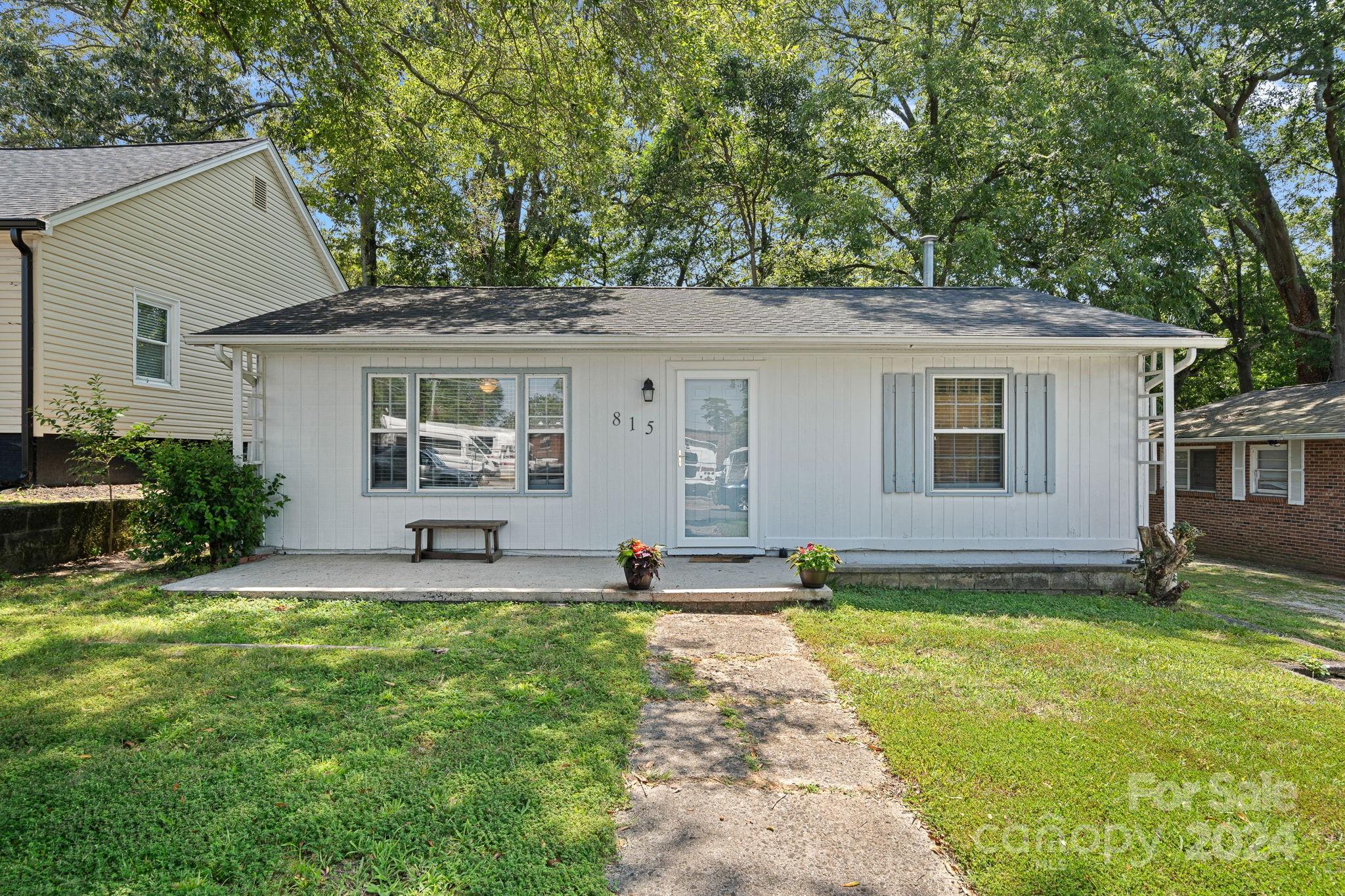 This home is just what you have been looking for.  2 Bedrooms, 1 Full Bath, Living Room, Kitchen with Breakfast area, Mud/laundry room.  Outside you will find a generously sized backyard with privacy, great front porch with room for rocking chairs and more. Located less than a mile from Historic Downtown Gastonia, short distance away from Loray Village featuring the redeveloped Loray Mill where you can enjoy a membership to the gym and pool, the Up-and-Coming FUSE district, and the New Stadium CaroMont Health Park!!!. Close to Restaurants, Shopping, Breweries, and Entertainment. Only 5 miles to Crowders Mountain State Park, 18 miles to Whitewater Center and 20 miles from Charlotte. NO HOA.  Enjoy your best life!!!