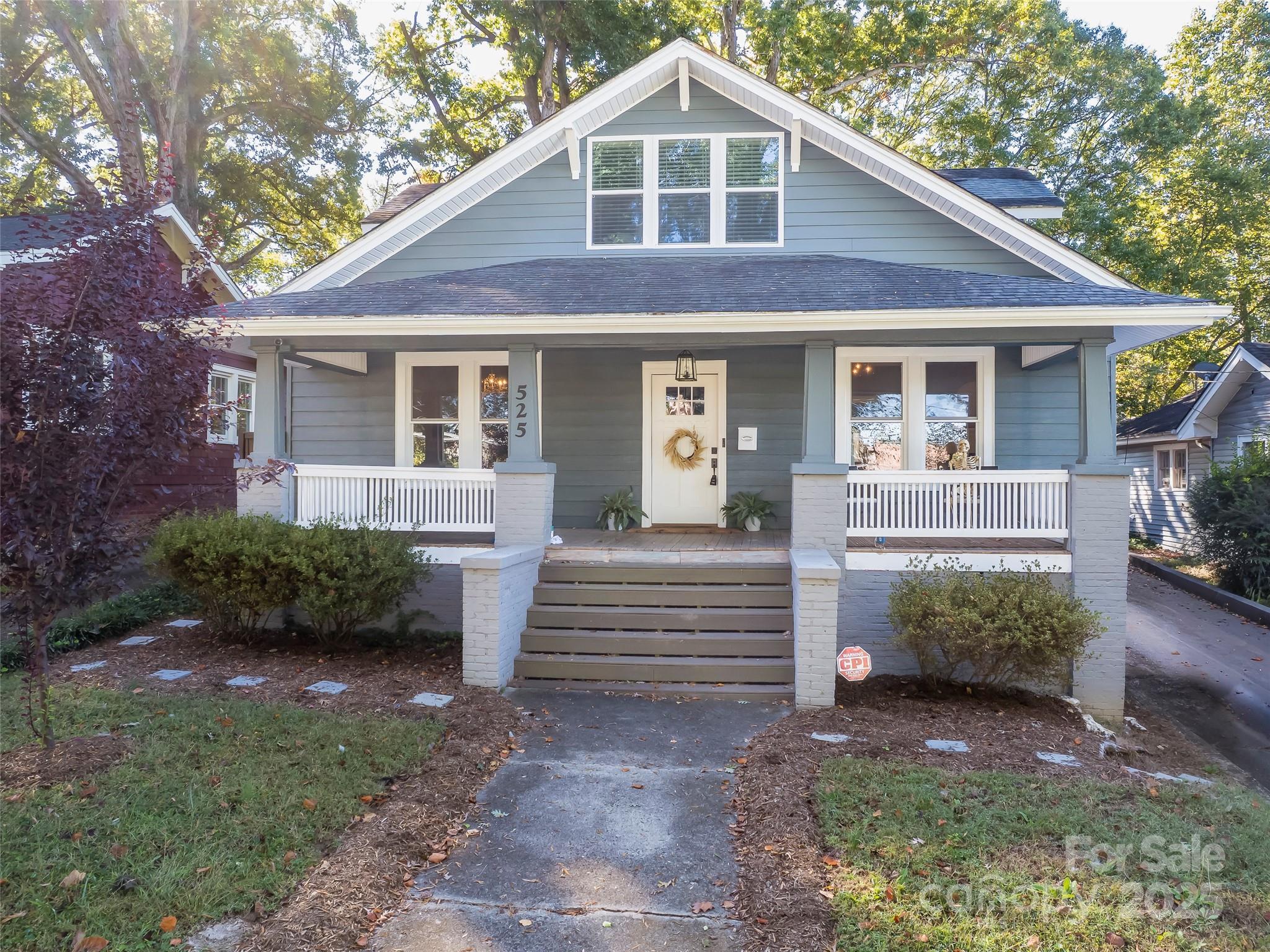 This Craftsman Cottage Has Been Beautifully Updated  & Restored.   Enjoy watching the World Go By From the Large Front Porch.  Then Step Into the Bright & Airy Living Room with Custom Wainscotting & Crown Molding.  The Adjacent Study Has Fantastic Built In Cabinets & Window Seats & Custom Desk Create Tremendous Storage.  The Dining Room is Grand with the Charm of a Beautiful Mantel & Custom Cabinets from the Original Design Blending Beautifully with the Modern Chandelier.  The Kitchen is All New.  Shaker Cabinets, Gleaming Countertops and Space Galore.  This Home is Great for Entertaining.   The Fenced Backyard Has Electric Gates for Easy Access & Privacy.  This House is a Real Charmer!!