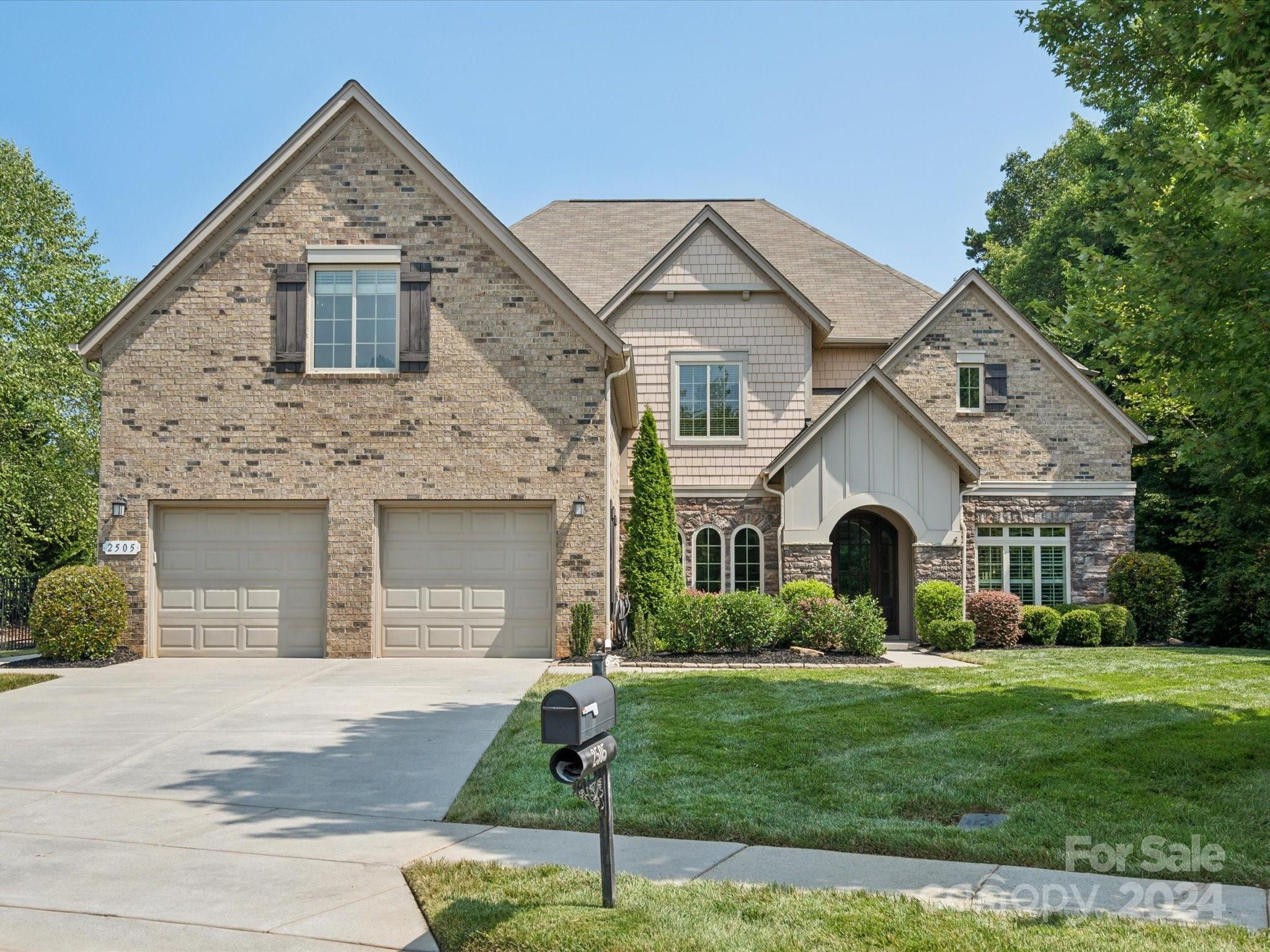 Waxhaw Beauty! Located in the popular Barrington community, this former model home offers the best in privacy, location, and layout. This home is set on a premium lot with mature trees next to a walking trail and a plethora of neighborhood amenities. The main floor features wide plank engineered hardwoods, neutral paint, and updated lighting. The kitchen boasts a large custom island, farmhouse sink, dedicated ice maker, gas cooktop, and stainless steel appliances. Enjoy natural light from large windows with architectural details and extensive trim work throughout the home. The family room and entryway include built-in shelves, while the dining room has plantation shutters and a dry bar. The main floor also has a convenient guest room with a full bath. The backyard retreat includes a private sports court, basketball hoop, and gas hookup for an outdoor grill. All this within the top-rated Marvin school district. This home truly has it all!