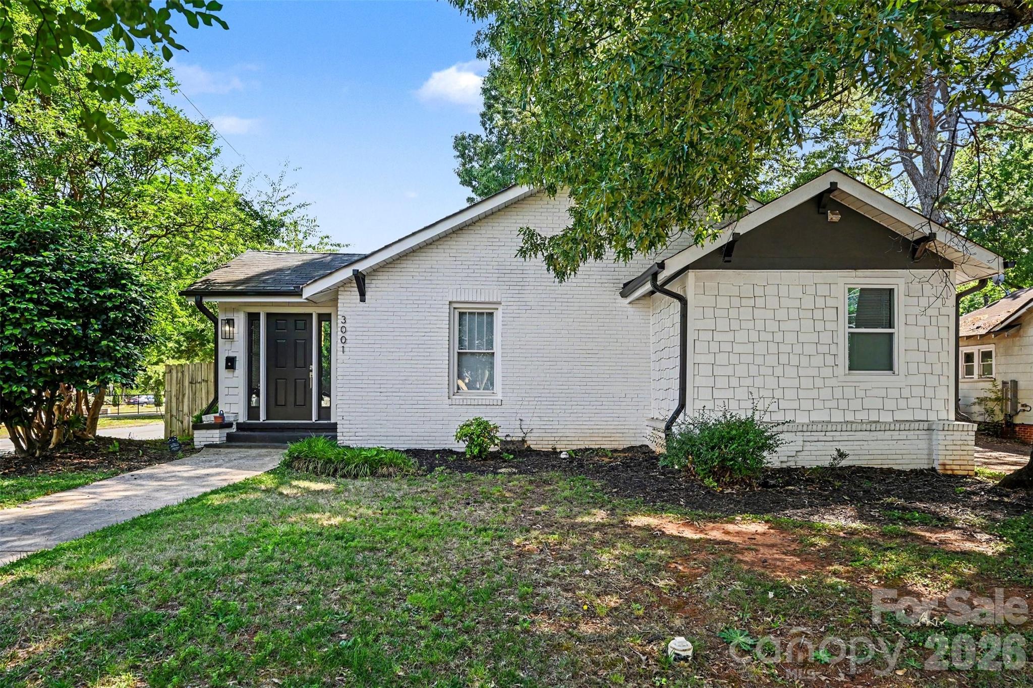 Beautifully renovated full brick bungalow in Enderly Park with NO HOA! Just blocks from Uptown Charlotte, this home offers a prime location with no rental restrictions, making it an excellent opportunity for a short-term rental or Airbnb. Enjoy close proximity to local coffee shops, restaurants, and Enderly Park, featuring basketball, tennis, and pickleball courts, a picnic shelter, and a dog park. Situated on a spacious corner lot, this 3-bedroom, 3 full bath home showcases hardwood and tile flooring throughout. The stylish kitchen is equipped with quartz countertops, shaker cabinets with soft-close drawers, and a large island with seating for four. The spacious primary suite features a walk-in closet, an additional closet, and a private en-suite bath with dual sinks, quartz counters, and a tiled walk-in shower. With easy access to major highways, Charlotte Airport, and a variety of nearby shopping and dining options, this home offers the perfect blend of convenience and charm. Schedule your showing today!