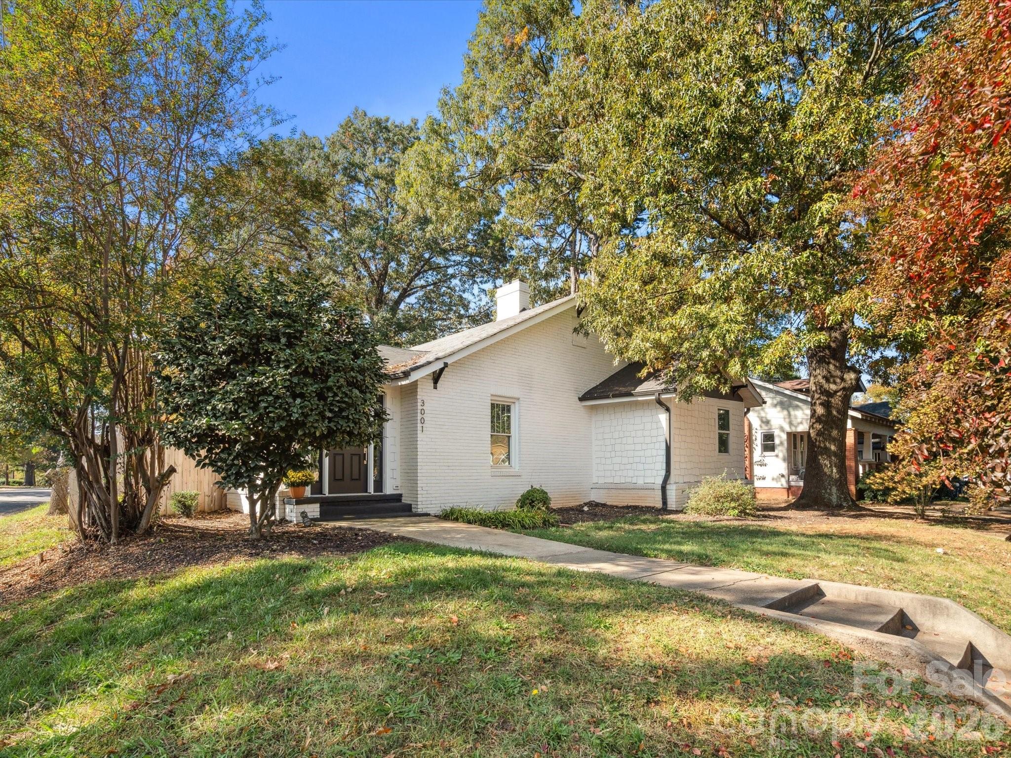 Beautifully renovated full brick bungalow in Enderly Park with NO HOA! Just blocks from Uptown Charlotte, this home offers a prime location with no rental restrictions, making it an excellent opportunity for a short-term rental or Airbnb. Enjoy close proximity to local coffee shops, restaurants, and Enderly Park, featuring basketball, tennis, and pickleball courts, a picnic shelter, and a dog park. Situated on a spacious corner lot, this 3-bedroom, 3 full bath home showcases hardwood and tile flooring throughout. The stylish kitchen is equipped with quartz countertops, shaker cabinets with soft-close drawers, and a large island with seating for four. The spacious primary suite features a walk-in closet, an additional closet, and a private en-suite bath with dual sinks, quartz counters, and a tiled walk-in shower. With easy access to major highways, Charlotte Airport, and a variety of nearby shopping and dining options, this home offers the perfect blend of convenience and charm. Schedule your showing today!