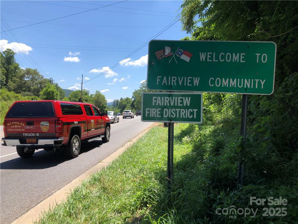 In Biltmore Township bordering Fairview Township. Located on 5 lane Hwy 74A Scenic Highway and Cedar Mountain Road. 3 miles to I-40, I-240, Blue Ridge Parkway & Asheville. Total of 1800 feet of road frontage (900 feet on Hwy 74A, 600 feet on Cedar Mountain Road and 300 feet on Atherton. Public water with fire hydrants on all three roads. Public sewer with 97,500 gallons per day allocation for 250,000 sf of commercial and 800 bedrooms. Gas, electric, cable and phone also on property at prime corner location at the top of Minehole Gap with over 20,000 cars per day. Double access curb cut on 5 lane Hwy 74A. Long range views. Owner Broker would consider joint venture. Price lowered another $60,000.