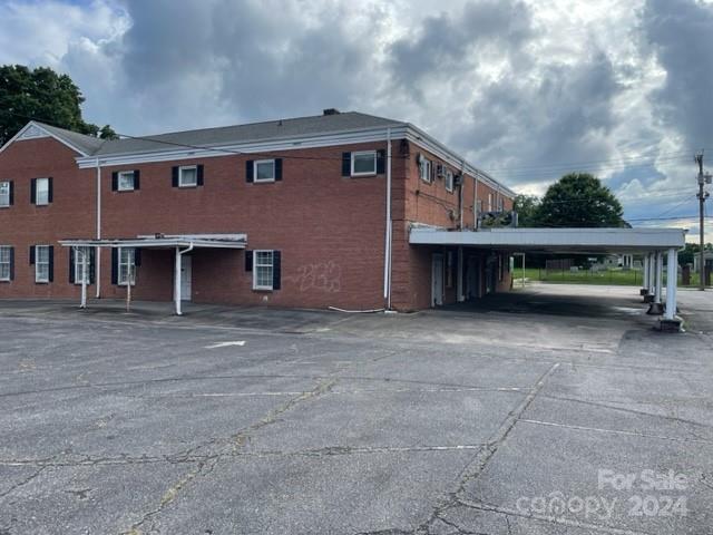 4 Parcels Parcel 1:  14,000 sf.  formerly a funeral home but deed restricted to no funeral home in future. $6,236 tax
                       2:  7,500 sf.  Tax rate $3,160   
                       3:  4,851sf.   Tax rate $2,235   Was Corporate office
                       4.  1,000 sf    Approx.   1 bedroom apartment and flower shop on bottom  Carriage House
                       5.   .49 acre parking lot  $1,311 tax rate
Property sold AS IS
Opportunity Tax  opportunity
321 South and North on each side of property.
Great opportunity for apartments, condos, car wash, training center
1 block from downtown historic gastonia,
4 Parcels.  Do not want to break up