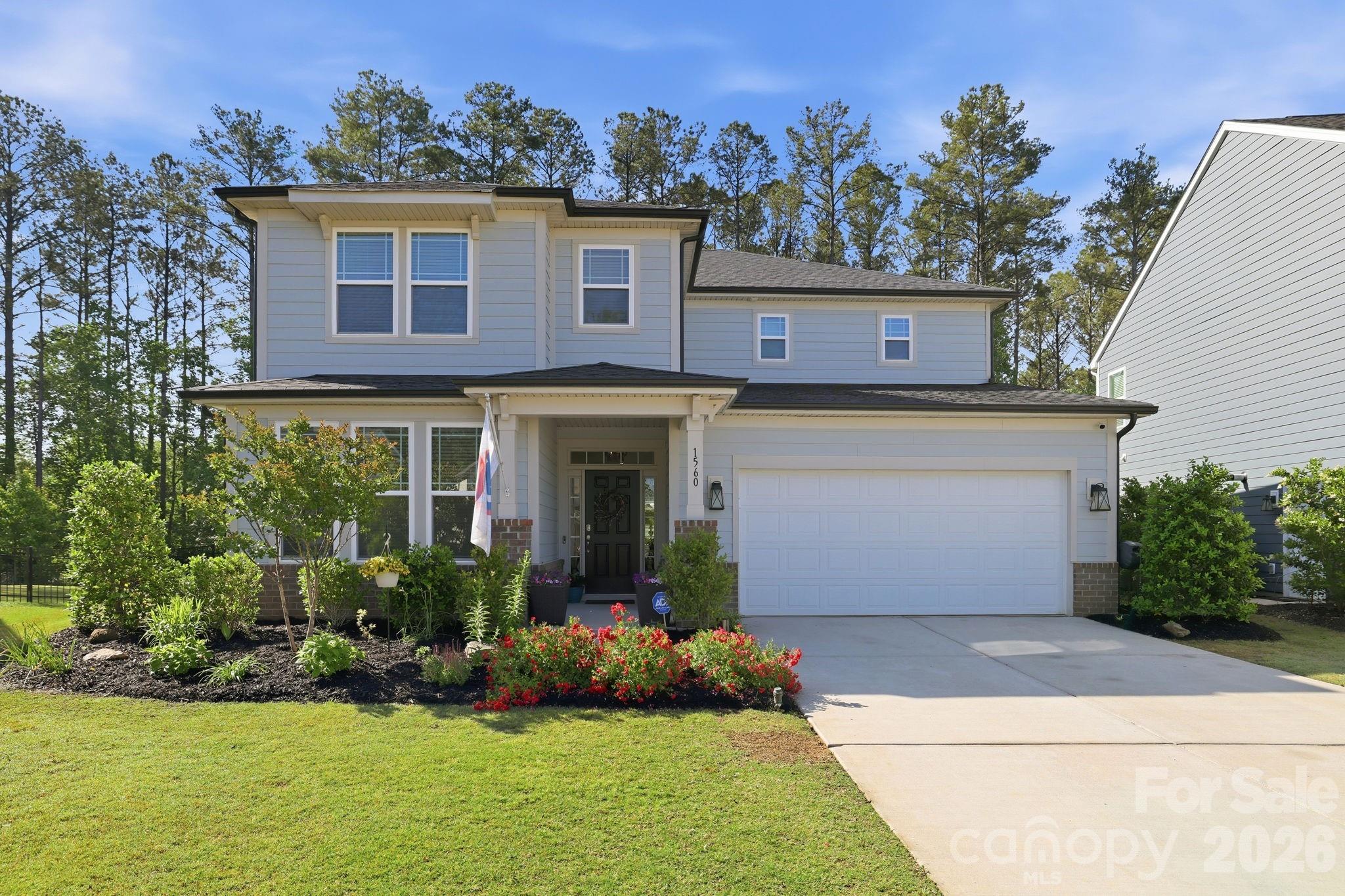 Welcome to your next chapter in the highly sought-after Paddlers Cove community—where lifestyle, location, and thoughtful upgrades come together seamlessly.

This beautifully maintained and extensively upgraded 4-bed, 3-bathroom home spans 3,104 sqft and sits gracefully on a quiet cul-de-sac with a level, fenced, tree-lined backyard, offering both privacy and functionality in one of Lake Wylie’s most desirable neighborhoods.

From the moment you arrive, the curb appeal and positioning of the home set the tone. Tucked away on a low-traffic street, this property offers a sense of retreat while still being minutes from community amenities, top-rated schools, and the lifestyle that makes this area so attractive.

Step inside and you’re immediately greeted by a refined entryway featuring custom wainscoting and trim work (Mar. 2025), setting a sophisticated tone that carries throughout the home. The main level is thoughtfully designed with both open-concept living and defined spaces, ideal for modern living.

The main-floor bedroom and full bath provide exceptional flexibility—perfect for guests or a private office. The downstairs bath has been elevated with custom trim work, adding subtle character and polish.

Moving into the heart of the home, the kitchen is both stylish and functional, featuring granite countertops, SS appliances, and enhanced by designer pendant lighting (Aug. 2022). A recently upgraded dishwasher (Oct. 2025) ensures modern convenience, while the adjacent breakfast nook is a standout feature with a custom-built bench with integrated storage and pendant lighting, creating a cozy and highly practical dining space.

The living room is equally impressive, anchored by custom-built cabinetry and shelving (April 2022) that not only add visual interest but also maximize storage and organization. Every detail here has been considered to create a space that is both inviting and efficient.

Upstairs, the home continues to deliver. A spacious*loft/bonus area offers endless possibilities—media room, playroom, second living space, or home office. This area has been upgraded with custom cabinetry, a quartz countertop workspace, and even a custom baby gate, demonstrating both design and practicality.

The primary suite and additional bedrooms provide comfort and privacy, all enhanced by ceiling fans and custom blinds installed throughout the home (April 2022). One of the upstairs bedrooms features a custom accent wall and Roman Spa like shower.

The laundry room has been significantly upgraded with custom cabinetry and a utility sink (Feb. 2025)—a feature that truly elevates everyday living. Additionally, the entire second floor received upgraded carpeting (March 2024), ensuring a fresh, move-in-ready feel.

Technology and efficiency have not been overlooked. The home includes smart WiFi-enabled thermostats (Jan. 2024) and a newly installed security system (July 2025), giving you peace of mind and modern control over your environment.

Storage is abundant throughout, including custom shelving in the downstairs storage closet and fully outfitted garage with custom storage solutions (July 2023).

Step outside and the backyard becomes your private retreat. The fully fenced yard (April 2022) is framed by mature trees, offering both privacy and a serene backdrop. The addition of a 12x22 patio (Mar. 2025).

Living in Paddlers Cove means access to one of the area’s most amenity-rich communities with two community pools, walking trails, clubhouse, lake access and proximity to Field Day park.

Every upgrade and improvement in this home has been thoughtfully executed, creating a property that stands out not just for its size and layout, but for its quality and attention to detail.