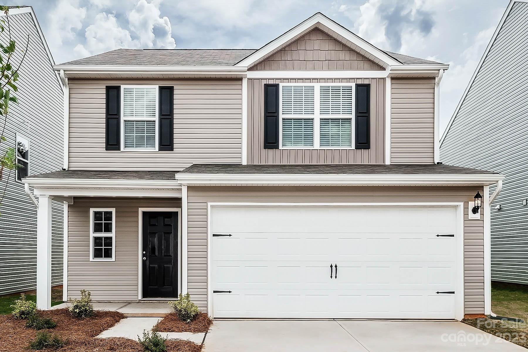 This two-story floor plan features an open-concept layout. The home boasts four bedrooms and two and
a half bathrooms including a stunning private master suite with a large walk-in closet. The covered front
porch gives this home great curb appeal while the private back yard provides a perfect outdoor space to
sit and relax in the evenings. With granite countertops, wood cabinetry with crown molding and
recessed lighting, the kitchen is the stunning centerpiece of the home.