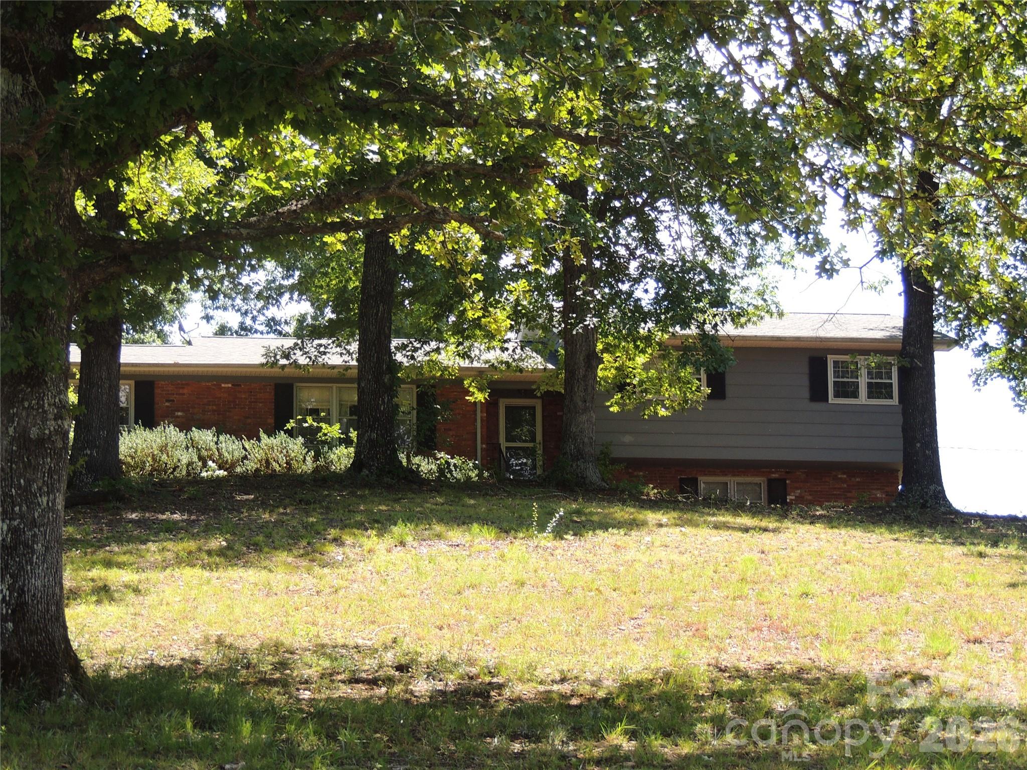 1971 Split Level Ranch on 11.4 ac with approximately 280 ft Frontage on the 2nd Broad River has 3 Br, 3.5 Ba, Den, Sunroom, Living / Dining Rm. Kitchen/ Breakfast Rm main house. This Homestead Property comes with 1900 SF Automotive Garage, 1100 SF Barn on concrete pad and a Guest Cottage at the River. The 1 Br, 1.5 Ba Guest Cottage built in 2000 has mini split HVAC and comes completely furnished with a full kitchen, furnishings and a covered porch facing the river. This property is ideal for Horse/Livestock, campsite development or farming with River access to water. The uses are endless. The main house needs some updates so the property is being offered AS IS.