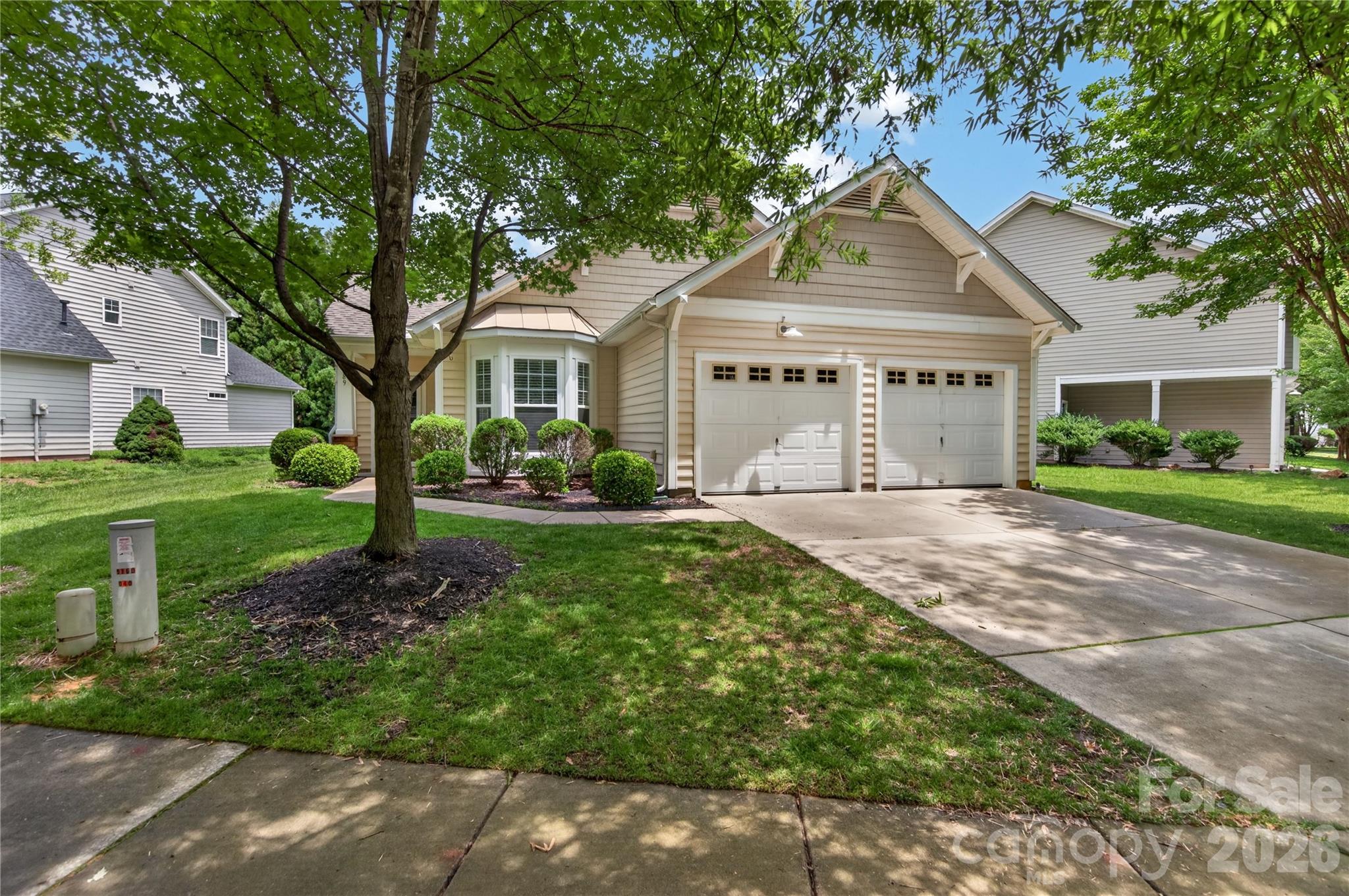 Welcome home to this adorable Craftsman-style ranch in the highly sought-after Callonwood community! Featuring a maintenance-free exterior with charming stone accents, this light-filled open-concept floor plan offers volume ceilings, gleaming hardwood floors throughout the main living areas, and an inviting flow perfect for everyday living and entertaining.
The spacious kitchen showcases warm maple cabinetry, solid surface countertops, and overlooks the bright and airy family room. A desirable split-bedroom floor plan provides added privacy, while the primary suite impresses with a vaulted ceiling, oversized walk-in closet, and spa-inspired bath complete with a relaxing garden tub, separate shower, and ceramic tile flooring.
All bedrooms feature durable luxury vinyl plank flooring, and Bedroom 3 offers exceptional versatility with sunny bay windows and elegant glass French doors — ideal for a home office, study, or guest room. The secondary bath includes ceramic tile flooring and a tub/shower combination.
Outside, enjoy a beautifully landscaped level lot with irrigation and an expansive backyard perfect for outdoor enjoyment. Additional highlights include an oversized two-car garage and low Union County taxes.
All of this in amenity-rich Callonwood, just minutes from downtown Matthews, the Brace Family YMCA, shopping, dining, parks, and more!