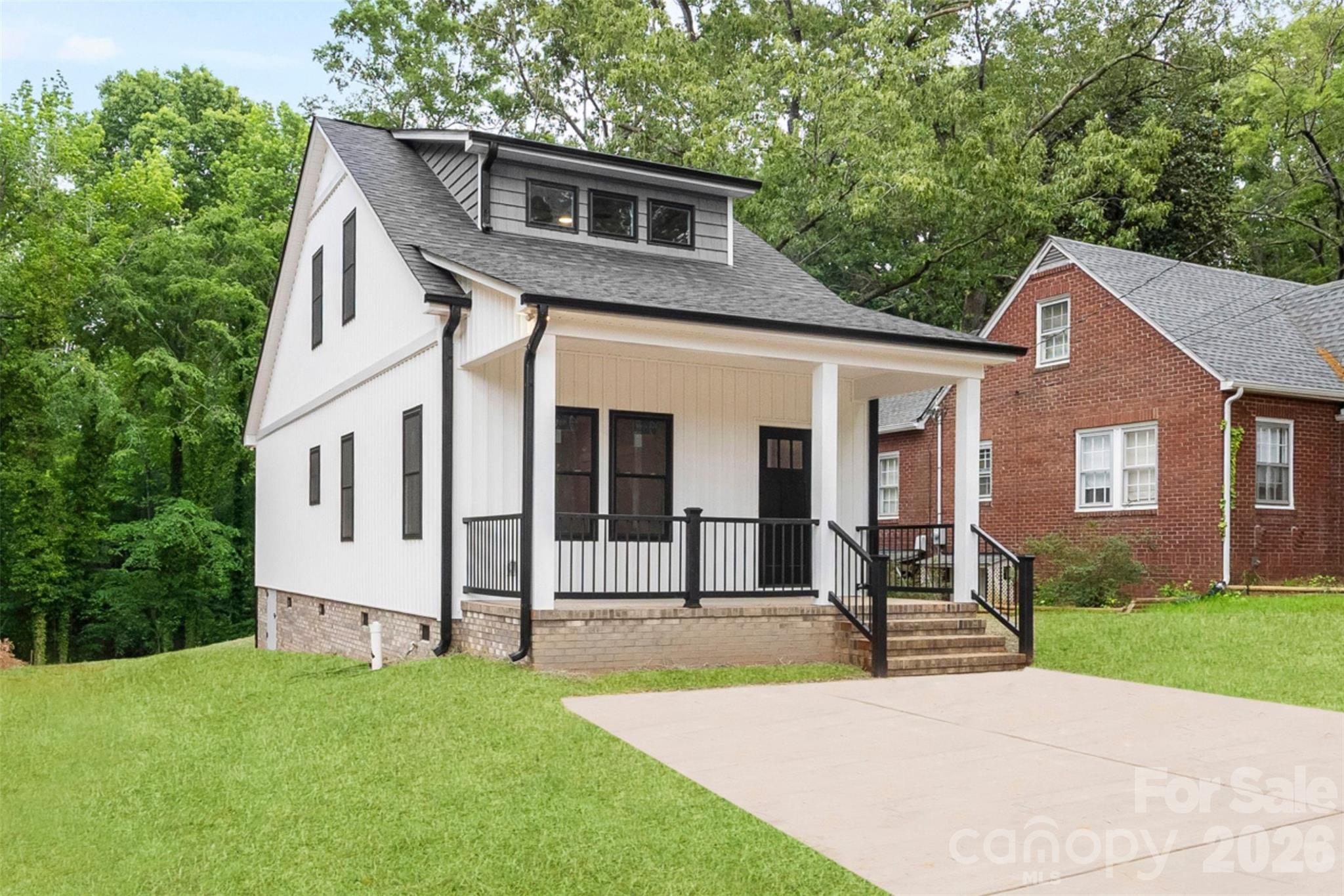 Super cute, beautifully crafted, and packed with curb appeal! This stunning new construction Contemporary home in Albemarle, NC delivers modern design, everyday comfort, and NO HOA! Relax on the gorgeous covered front porch or enjoy the spacious backyard perfect for entertaining, play, or outdoor living. Inside, you’ll love the tall 9’ ceilings and primary suite on the main level, creating an open feel with the convenience buyers are searching for. Durable LVP flooring flows throughout, while the kitchen features granite countertops and all four stainless steel appliances conveying for a true move-in ready opportunity. Conveniently located near shopping, dining, schools, and commuter routes, this home blends style, function, and location. If you’re looking for a move-in ready home with modern finishes, primary on main, covered porch, and spacious yard in Albemarle NC, this standout Stanly County property checks the boxes!