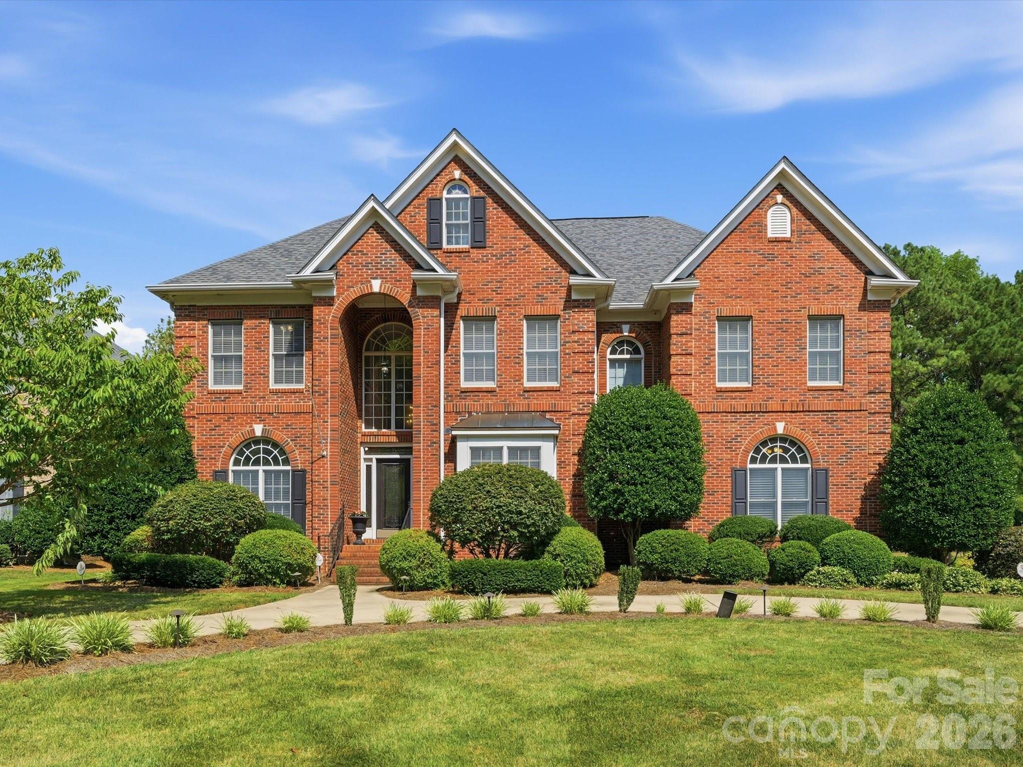 Welcome to this exceptional home in the highly sought-after Providence Country Club, one of South Charlotte's premier communities. Offering 5 bedrooms, 4 full bathrooms, and an oversized bonus room, this thoughtfully designed home combines spacious living with exceptional indoor and outdoor entertaining.

The main level features a desirable guest bedroom and full bathroom, perfect for visitors or multigenerational living. The expansive kitchen is the heart of the home, offering an open layout that flows seamlessly into the living spaces and a beautiful sitting room overlooking the private backyard oasis.

Step outside to enjoy resort-style living with a sparkling pool, patio pavers, multiple seating areas, and a built-in outdoor grilling space, ideal for entertaining or relaxing all summer long.

Upstairs, the spacious primary suite offers a peaceful retreat with two walk-in closets. Three additional bedrooms and an oversized bonus room provide flexible space for a media room, playroom, home office, or fitness area.

Additional highlights include a 3-car garage, circular driveway, and an ideal floor plan designed for both everyday living and entertaining.

Located just minutes from I-485, Blakeney, Stonecrest, Waverly, and Rea Farms, this home is zoned for top-rated schools and offers an unbeatable South Charlotte location.

Residents have the opportunity to enjoy optional Providence Country Club memberships, with packages featuring golf, tennis, pickleball, swimming, clubhouse dining, fitness amenities, and a vibrant calendar of social events.

This is a great opportunity to own a beautiful home in one of South Charlotte's most desirable neighborhoods.