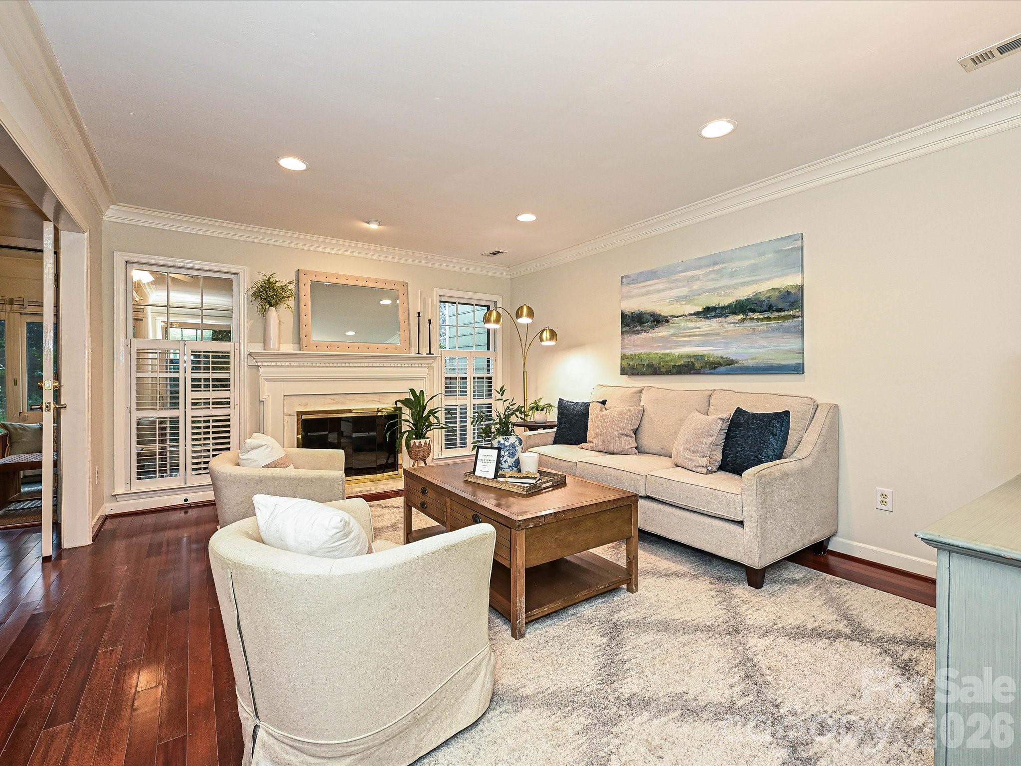 Rare South Charlotte townhome with THREE private bedroom suites, including a highly sought-after main-level suite, in a walkable location across from Harris Teeter, Starbucks, CVS, dining, and everyday conveniences.

Beautifully maintained and thoughtfully designed, this home offers a floor plan that is rarely available at this price point. Each of the three spacious bedrooms enjoys its own private ensuite bath, creating exceptional flexibility for guests, multi-generational living, roommates, a home office, or simply the convenience of having private space for everyone.

Fresh neutral décor, generously sized rooms, and abundant natural light create a warm and inviting atmosphere throughout. The welcoming living room is anchored by a gas log fireplace and flows seamlessly into the dining area, making the home equally suited for comfortable everyday living and entertaining.

The kitchen serves as the heart of the home and features all-new stainless steel appliances, abundant cabinetry, excellent workspace, and easy connection to the surrounding living areas.

One of the home’s standout features is the incredible heated and cooled sunroom, providing valuable year-round living space filled with natural light. Open the large sliding doors to enjoy the feel of a screened porch on beautiful Carolina days. Whether used as a reading retreat, morning coffee spot, home office, fitness room, or entertaining space, this versatile room quickly becomes a favorite feature of the home.

The main-level bedroom suite offers exceptional flexibility and convenience, while the upper-level suites provide privacy and generous living space. Few townhomes in South Charlotte offer this combination of THREE private suites including a main-level bedroom, making this home uniquely adaptable to a wide variety of lifestyles.

Located in the established Carmel Hollow community, residents enjoy access to a community pool and clubhouse, along with two dedicated parking spaces conveniently located just steps from the front entrance. Plus, enjoy the convenience of leaving the car behind for many daily errands, with grocery shopping, coffee, dining, pharmacy services, and neighborhood retail all located directly across the street.

The location places you in the heart of South Charlotte, just minutes from Carmel Country Club, Quail Hollow Club, the Harris YMCA, SouthPark, and Phillips Place.

Zoned for Beverly Woods Elementary, Carmel Middle School, and South Mecklenburg High School, this home offers an exceptional opportunity to enjoy low-maintenance living in one of Charlotte’s most desirable and established neighborhoods.

At $410,000, this home represents an outstanding value for buyers seeking space, flexibility, walkability, and one of South Charlotte’s most convenient locations.

Please note: HOA guidelines permit rentals only to direct family members.