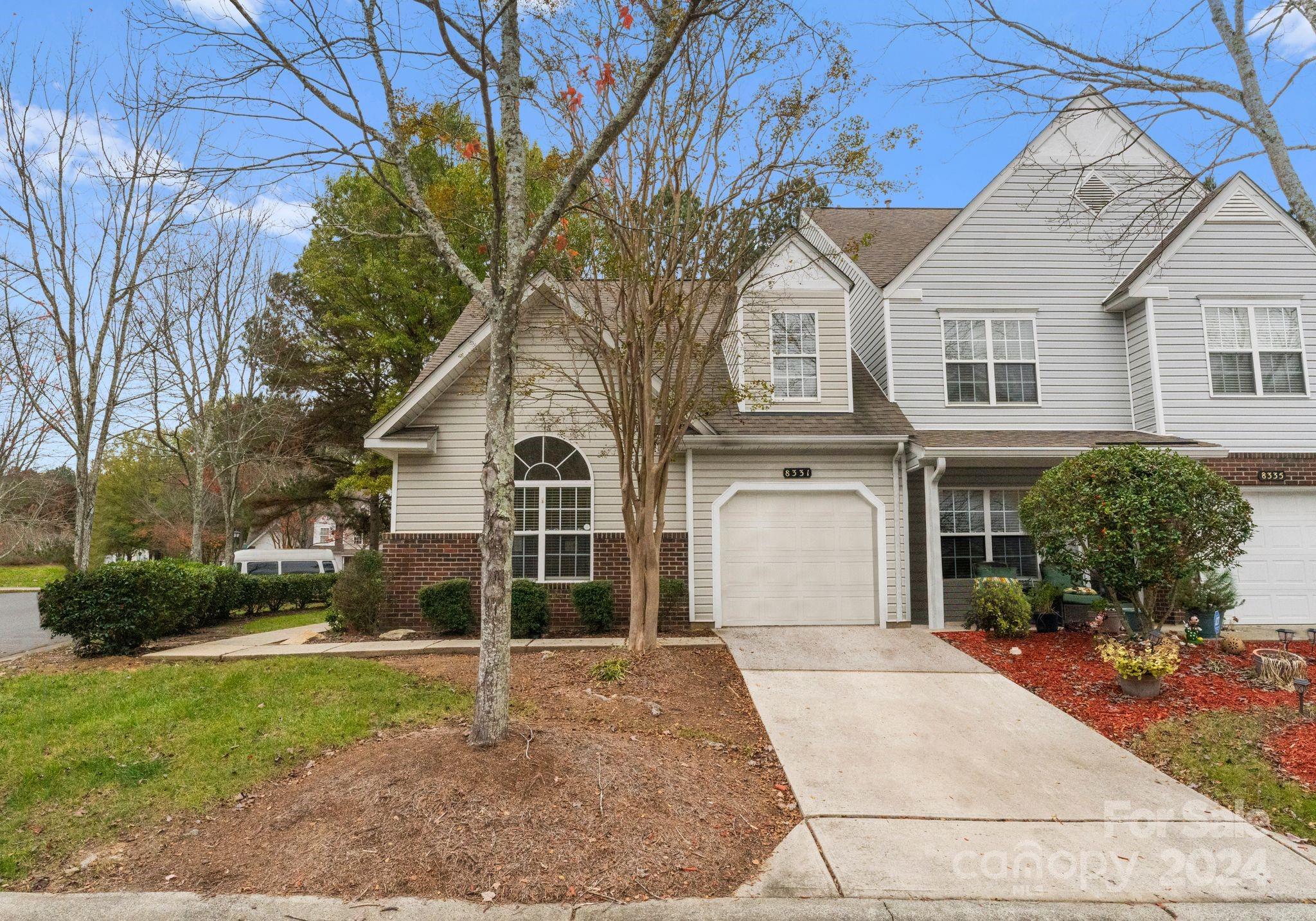 This move-in-ready townhome on Christmas Court could be yours for the holidays. The open floor plan makes it the perfect place to host your friends and family. The kitchen has ample counter space to appease any cook. The vaulted ceilings welcome natural light, making this home warm and inviting. The large primary suite on the main level has a walk-in closet and double vanity. Upstairs, you will find a spacious loft perfect for an office or kids' playroom. The expansive upstairs bedroom boasts an adorable nook for a desk or reading area. Outside, you will find the perfect porch for grilling or relaxing.  The community features include walking trails and a pool. The refrigerator, washer, and dryer are all included!
Professional photos coming 11/21.