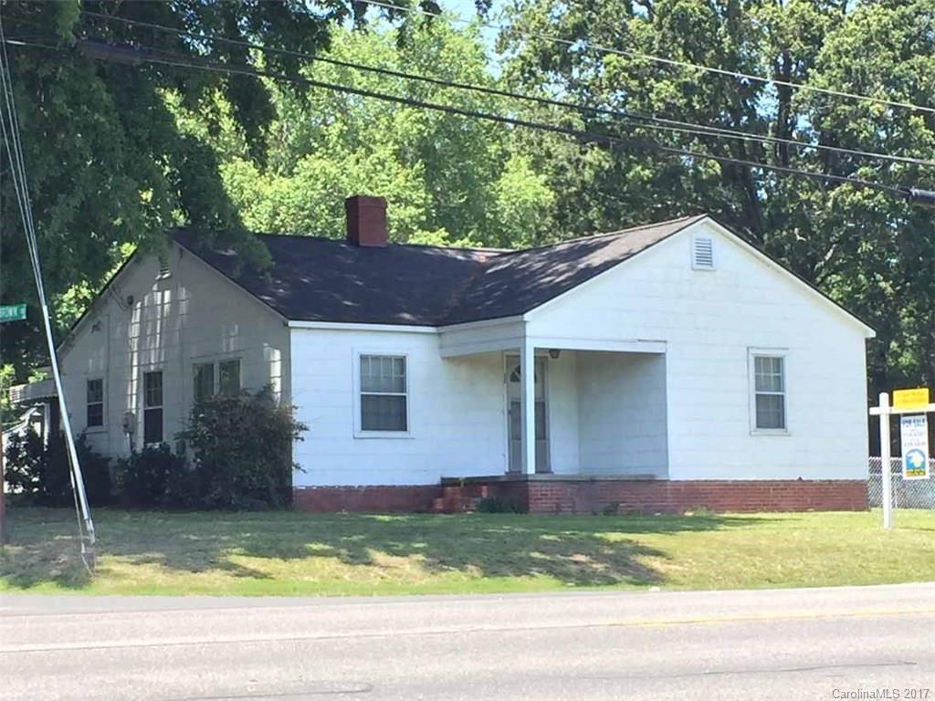 Ideal "fixer upper"!  This 2-bedroom, 1-bath features kitchen, living room, office, 2-car carport, storage buildings with power and concrete flooring.  Remodeled kitchen and bath.  Priced to sell!!