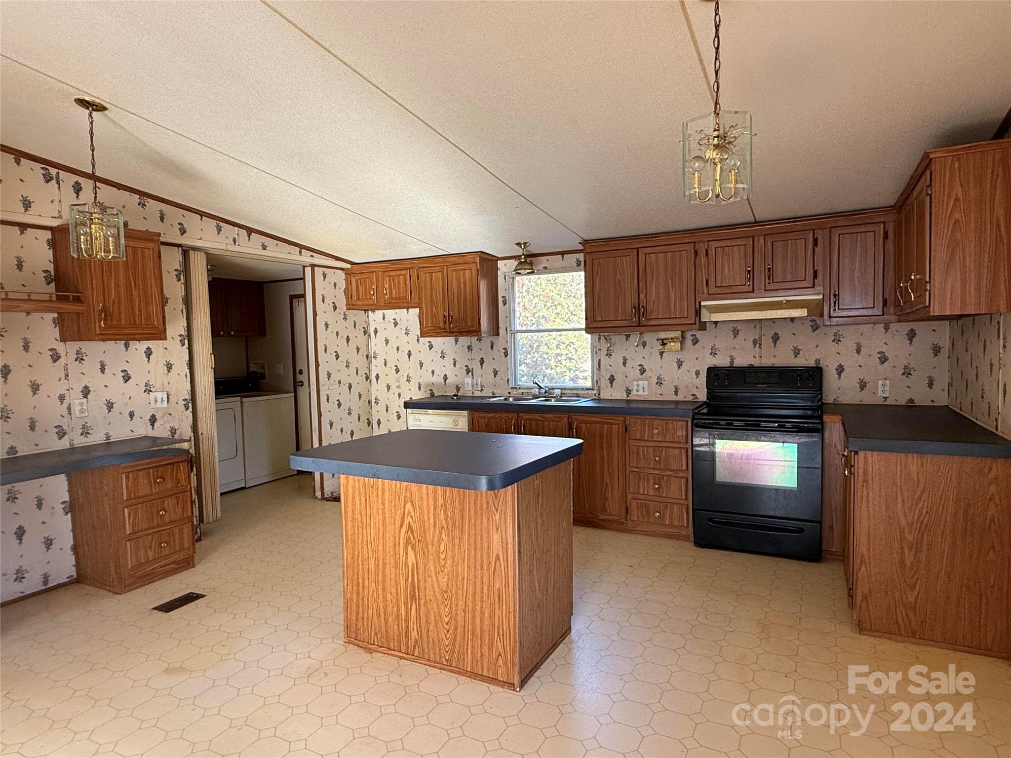Calling all investors and thrill-seekers! This 1997 Fleet mobile home is your next adventure! Nestled on 2 acres of prime Buford real estate, this fixer-upper is a diamond in the rough with endless potential.  With a little TLC and a great lawn mower you can turn this spacious 3 bedroom, 2 bath property into a HOME.  Regardless if you're looking to add to your fleet of rentals or looking to make this your humble abode -  Just remember to bring your  lawnmower, and a healthy dose of humor. And maybe a tetanus shot as you work through your very own jungle paradise.  But hey, at least you'll have plenty of fresh air, a great view of the local wildlife, and a mystery building hidden somewhere in the overgrown weeds.  Unleash the thrill-seeker within and let this home be your next adventure.  Cash only, folks.  No credit cards accepted.  This is a cash-only deal for the adventurous at heart.  Property to be sold is, where is, how it sits.