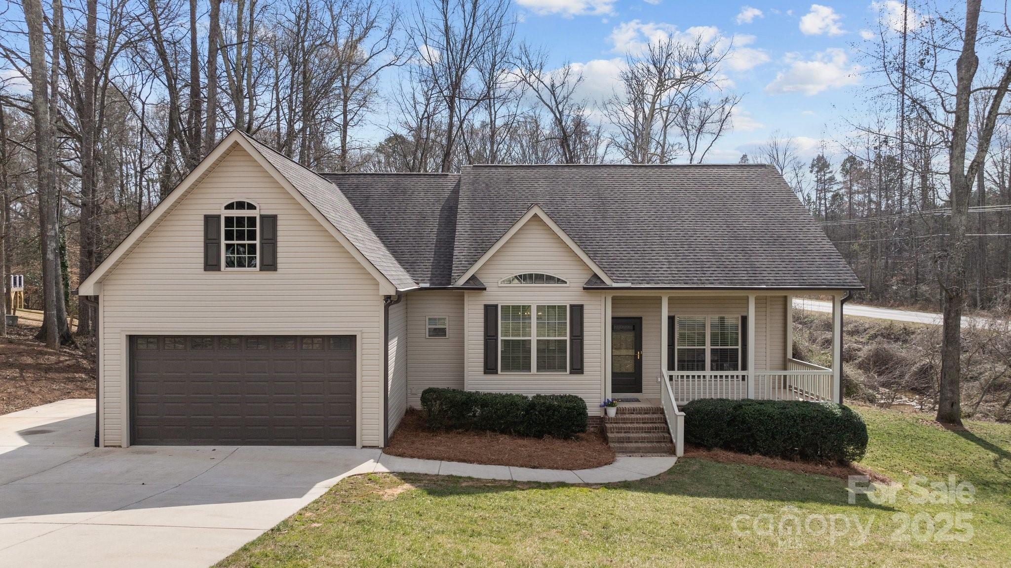 Welcome to 910 Pine Knoll Road, a charming 3-bedroom, 2-bath home nestled in the desirable Edgewoods neighborhood of Fort Mill.  Built in 2018, this 1,700 sqft home features an open floor plan that seamlessly connects the living, dining, and kitchen areas. The spacious living room with gas fireplace invites relaxation, while the kitchen boasts Granite Countertops, ample storage, and a functional layout ideal for both everyday living and entertaining. The primary bedroom serves as a private retreat, complete with an en-suite bathroom for added comfort. Two additional bedrooms provide flexibility for family, guests, or a home office setup. With new laminate flooring and the entire inside freshly painted this home is a must see!