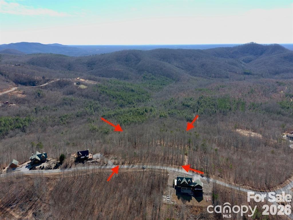 Build your dream mountain retreat on this beautiful .78 ac homesite located on Lot 244 Scenic Vista Drive in the highly sought-after Grandview Peaks community of Nebo. Nestled in the scenic foothills of Western North Carolina, this vacant lot offers the perfect blend of privacy, natural beauty, and upscale mountain living.

Located within Grandview Peaks, a gated community known for its paved roads, underground utilities, and well-maintained common areas, this property provides both security and convenience. Enjoy peaceful surroundings, long-range mountain views, and the serenity of nature while still being within a short drive to Marion, Lake James, and I-40.

With ample space to build, this lot offers flexibility for your custom mountain home—whether you’re envisioning a full-time residence or a weekend getaway. Community amenities include a private lake, walking trails, and a community pavilion, enhancing the lifestyle appeal.

Don’t miss this opportunity to own a piece of the Blue Ridge Mountains and create your perfect mountain escape in Grandview Peaks.