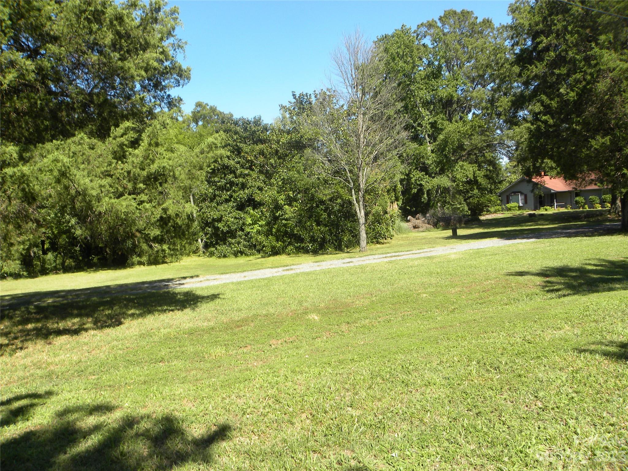 Great location in the Steel Creek area, close to the Rivergate shopping area.  Across from the Emergency Room. The property has a 2000 ft. brick structure.  Property has been rezoned for commercial use.  Do not walk on deck or bridge in the back yard. Walk the side road to the back of property.