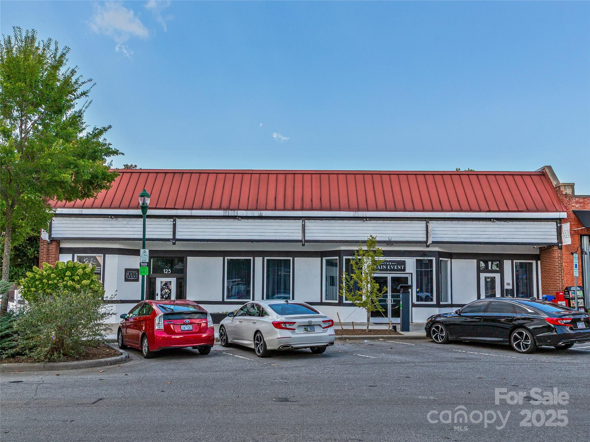 Formerly the home of the Flat Rock Playhouse & Main Event. This 0.56 ac. land/building package across three parcels is ready for its next act! Primed for conversion & expansion, 125 S Main is ideal for a boutique hotel with rooftop venues, luxury condos, mixed-use retail or re-scaled live entertainment! Located within 1 block of the newly opened Ecusta Trail & Visitors Center, 125 S Main lies in the heart of the city’s social district & growth hub for music, dining, & entertainment! Set the stage, be the catalyst that propels the next generation of downtown growth! All elements to success- constant foot traffic, vibrant dining, retail & cultural attractions are here now!