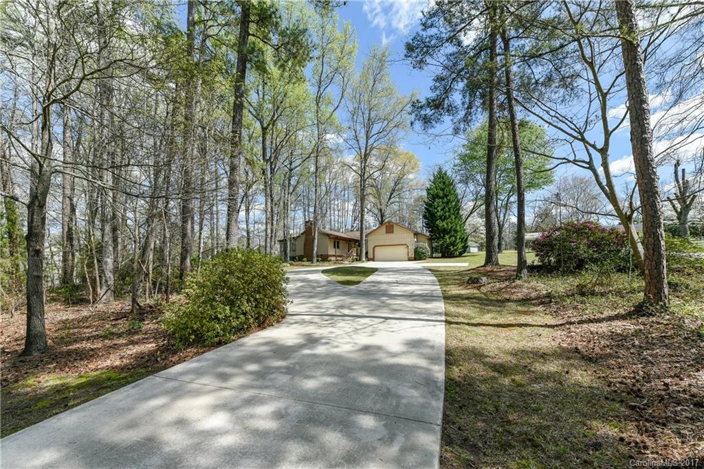 Charming ranch home nestled on a little over 1.5 acres off Dobys Bridge. . . a RARE find in Ft Mill!  Your buyer will be thrilled with the updates!  Renovated bathrooms & kitchen feature tile floors, tiled showers, granite counters, fresh paint . . . beautiful colors! Heated/cooled sunroom offer peaceful views & leads to deck. Newer HVAC, new energy efficient windows, roof less than 5 years old.  Fenced backyard. Large driveway with room to turn around & extra parking. No HOA.  Better hurry!