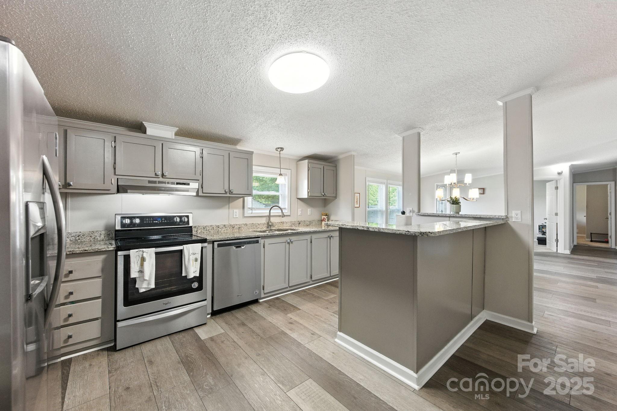It’s hard to believe you can have such a large and beautifully updated home at this price point. The kitchen features granite countertops, stainless steel appliances, and abundant cabinet space. Perfect for everyday living and entertaining. The open living area showcases stylish LVP flooring and great natural light. The oversized primary bedroom offers a true retreat with a sitting area, large walk-in closet, and spa-like bath. With four bedrooms and an office, there is plenty of room for everyone. You’ll love the backyard just as much as the home itself, enclosed with a a privacy fence for enjoying the deck and a covered patio; ideal for relaxing or hosting friends. This property has been secured with a VA loan and the LOW interest rate may be assumable, offering an exceptional opportunity for qualified buyers. Don’t miss your chance to make this beautiful, move-in ready home yours!