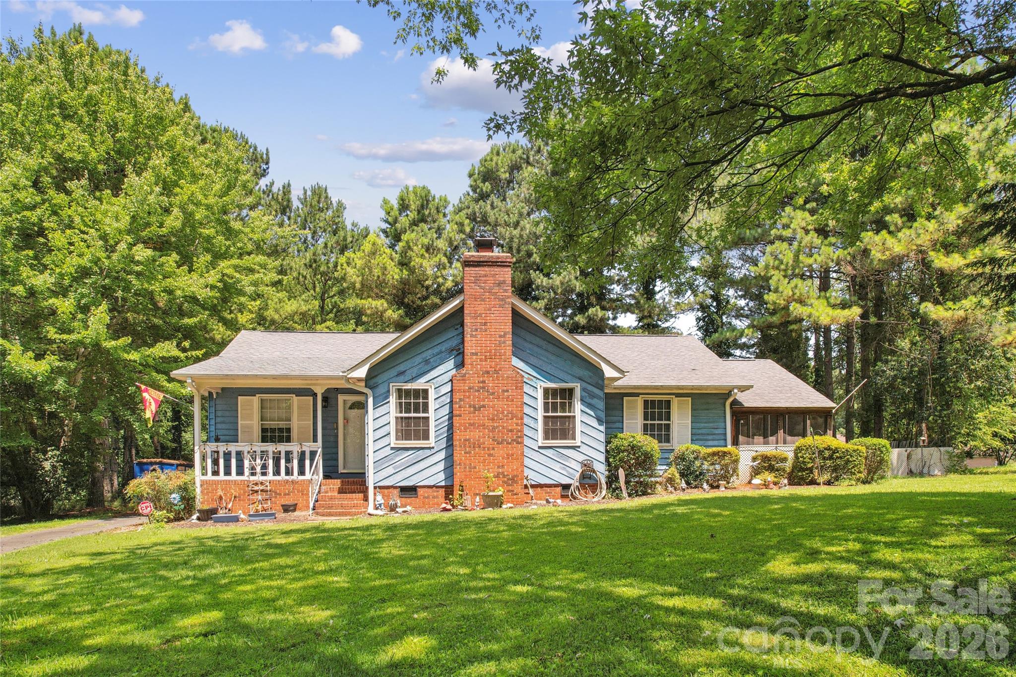 Looking for space both inside and out? This 3-bedroom, 2-bath home offers the perfect combination of comfort, functionality, and outdoor enjoyment. The welcoming floor plan features a kitchen, dining room, and family room with a cozy gas fireplace, plus new carpet for fresh move in feel. Enjoy your morning coffee on the covered front porch, unwind on the screen porch or entertain on the back deck overlooking the large, fenced back yard. The outdoor space is packed with extras including a tranquil koi pond, storage building, wired workshop, detached carport, and plenty of room for gardening, hobbies or recreation. Whether you're looking for space to relax, entertain, or tackle your next project, this property offers endless possibilities.