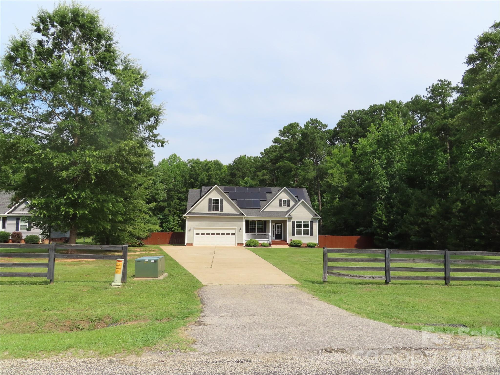 Welcome home to 2239 Cedar Rd, York SC 29745- Where privacy, space and energy efficiency come together on a beautiful 1 acre lot with NO HOA!
This well maintained home features 3 spacious bedrooms and 2 full bathrooms, with a thoughtfully designed split-bedroom floor plan that places the primary suite on the opposite side of the home for added privacy. A 2 car garage provides plenty of storage, while the bonus room above the garage offers endless possibilities as a home office, media room, playroom, gym or guest space.
The primary suite offers a large walk in closet and an ensuite bathroom complete with a soaking tub and a separate walk in shower, creating the perfect retreat after a long day.
Recent updates make this home truly move in ready, including fresh paint throughout, new carpet in all bedrooms, and newly stained front porch and back deck. 
Step outside to enjoy the fully fenced backyard, surrounded by mature trees that create a peaceful, private setting with plenty of room for pets, play or entertaining.
One of the home's standout features is the owned solar panel system, which will convey with the property and helps reduce monthly electrical costs- providing long term energy savings and added value.
If you've been searching for a home with land, privacy, no HOA, and modern energy efficient features, this York property is one you won't want to miss.