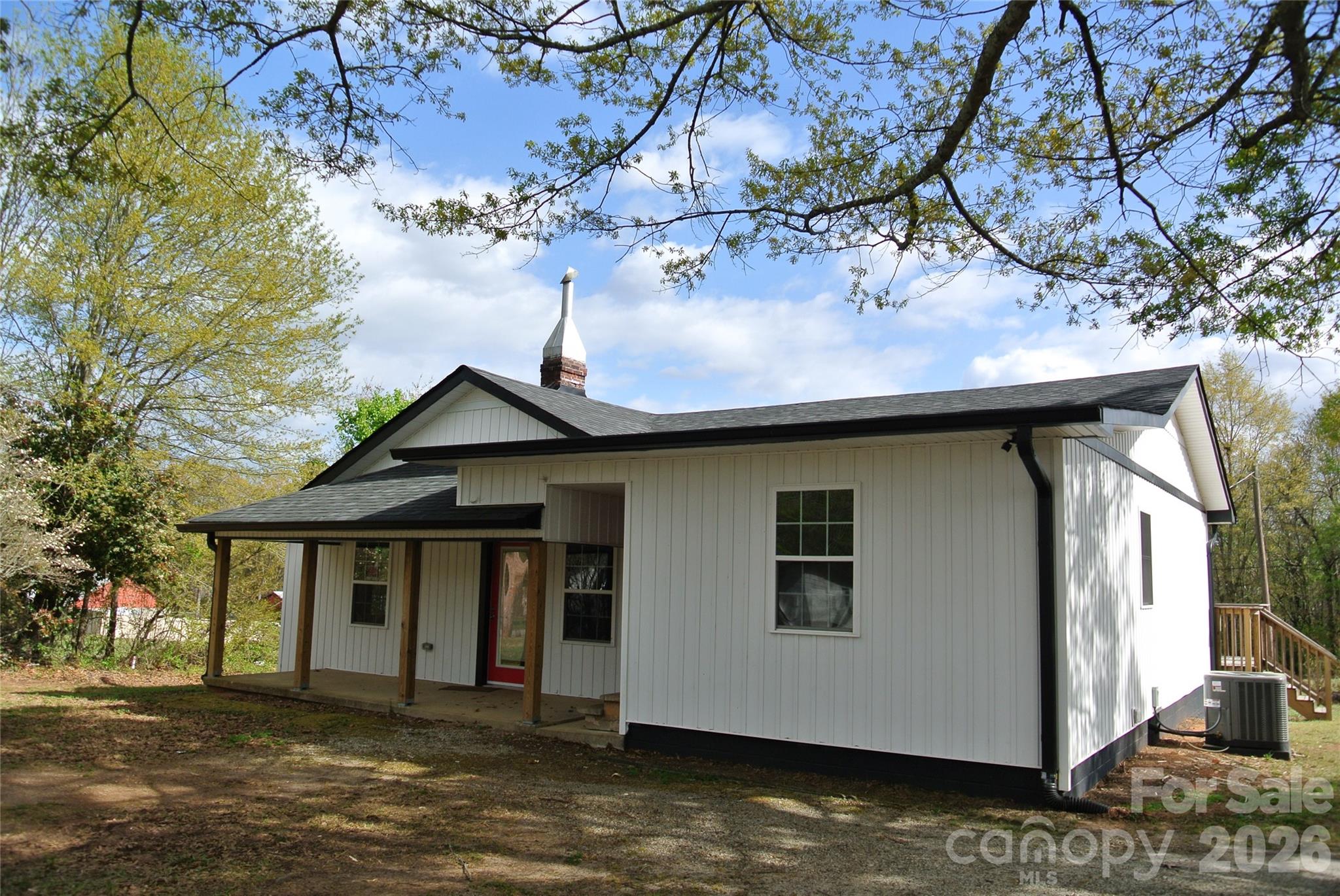 Newly remodeled bungalow style home. This adorable home features all new siding, windows, roof and HVAC. Interior features all new flooring, Paint and fixtures, updated plumbing and electrical. The large remodeled kitchen features tons of cabinet space, granite countertops and tile backsplash, electric range and refrigerator. The remodeled bathrooms are well appointed and feature beautiful new vanities. Come relax on your covered front porch or entertain on a large back deck. Also, plenty of storage space in the large outbuilding and basement garage area. The corner lot has plenty of space for a play area or garden. Don't miss out on this move-in ready home!