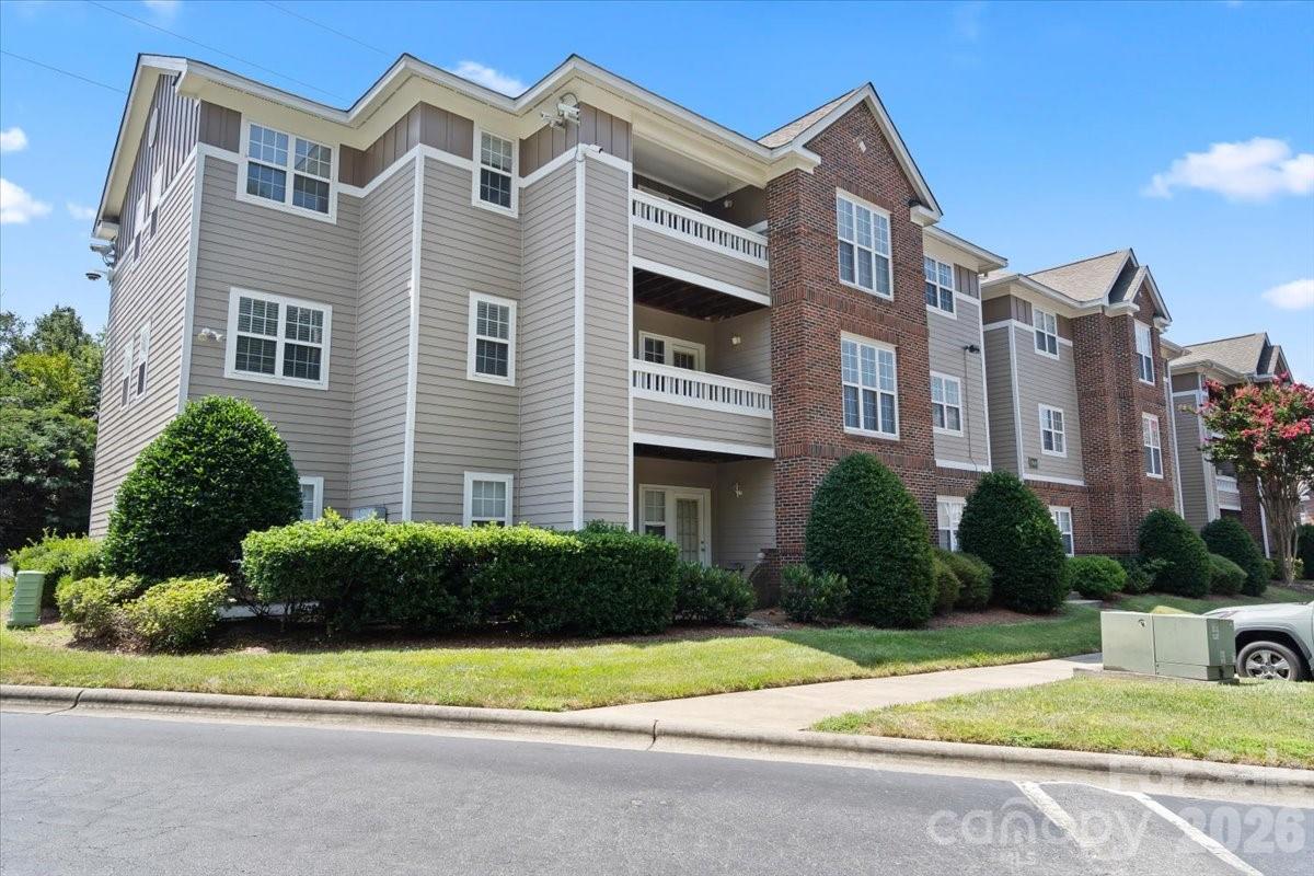 Stylish 3-Bedroom Condo Just Steps from UNCC!

College move-in season is almost here—don't miss this incredible opportunity to own a move-in ready condo within walking distance of UNC Charlotte! Whether you're looking for a home for your student, a roommate-friendly residence, or an excellent investment property, this beautifully maintained 3-bedroom, 2-bath condo checks all the boxes.

The bright, open-concept floor plan is filled with natural light and offers a spacious living area that flows seamlessly into the dining space and kitchen—perfect for everyday living or entertaining. The kitchen features wraparound countertops, and an abundant cabinetry

The spacious primary suite offers a walk-in closet and private en-suite bath, while two additional bedrooms provide flexibility for roommates, guests, or a home office. A separate laundry room adds extra convenience.

Step outside to your private patio —an ideal spot to enjoy your morning coffee, study outdoors, or unwind after a long day.

This home is truly move-in ready with conveniences, including:

Washer, dryer, and refrigerator included
Blinds on all windows and patio doors
Ceiling fans in every bedroom
Dedicated laundry room

The HOA provides exceptional value by covering water, high-speed internet/Wi-Fi, and Spectrum cable, making ownership even more affordable.

Located just behind the building is a direct walking path to UNC Charlotte, with shopping, restaurants, entertainment, light rail access, and major highways all just minutes away. Whether you're purchasing for your own student or adding a low-maintenance property to your investment portfolio, this condo offers the location, convenience, and value you've been searching for!