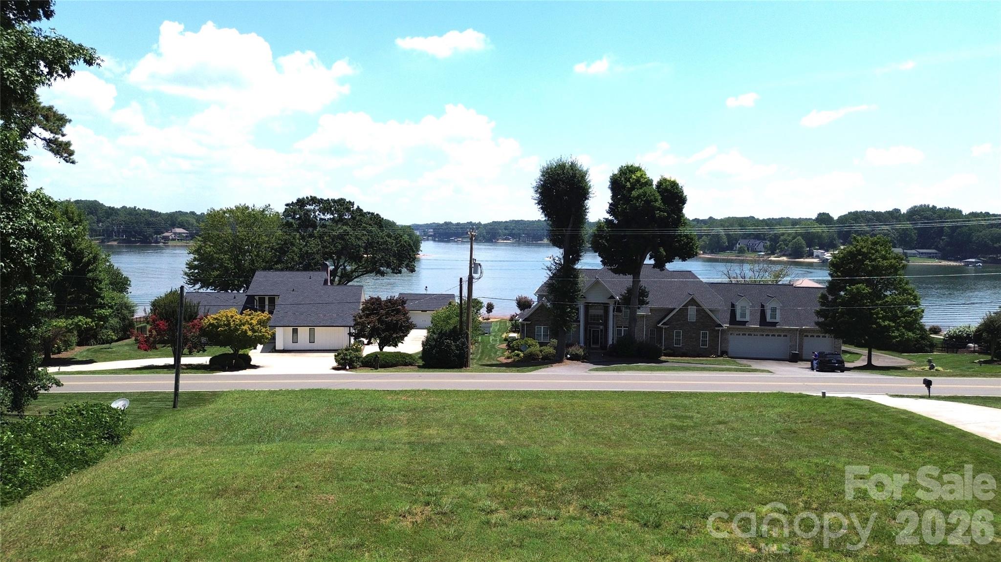 RARE WATER VIEW LOT .46 acre, city water, city sewer. Close proximity to Lakeshore Schools, shopping, dining and Stumpy Creek boat launch.