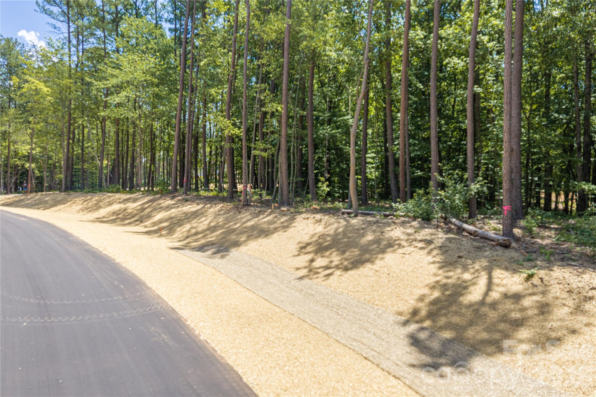 After much anticipation the Preserve at Grassy Creek Phase 2 is ready!  With only 13 wooded lots available ranging from 1 acre to 3.2 acres, privacy abounds in a subdivision where you can get out and walk your dog, soak up the peace found off the beaten path yet be a short drive to anything you desire!  Lot 4 is perfectly located  at the culdesac for Pine Creek Drive.  Sitting at 1.4 acres this lot has  already perk tested for a 4 bedroom home.  Enjoy the tree cover for a natural buffer from your neighbors.  The Preserve at Grassy Creek- Phase 2 (Denver, NC) is located about 30 minutes from Charlotte Douglas Airport, 40 minutes from downtown Charlotte and just minutes from shopping, restaurants, breweries, doctors offices and of course coffee shops!  Also to note a new gas station is coming soon to Hwy 16/150 intersection as well so it will be easy to fill up on your way to Hwy 150 or when you jump on new Hwy 16 to shoot to Charlotte.  This area is booming, don't delay and schedule a private tour today!  

Underground utilities will be installed soon.  Minimum 1800 sq ft to build.