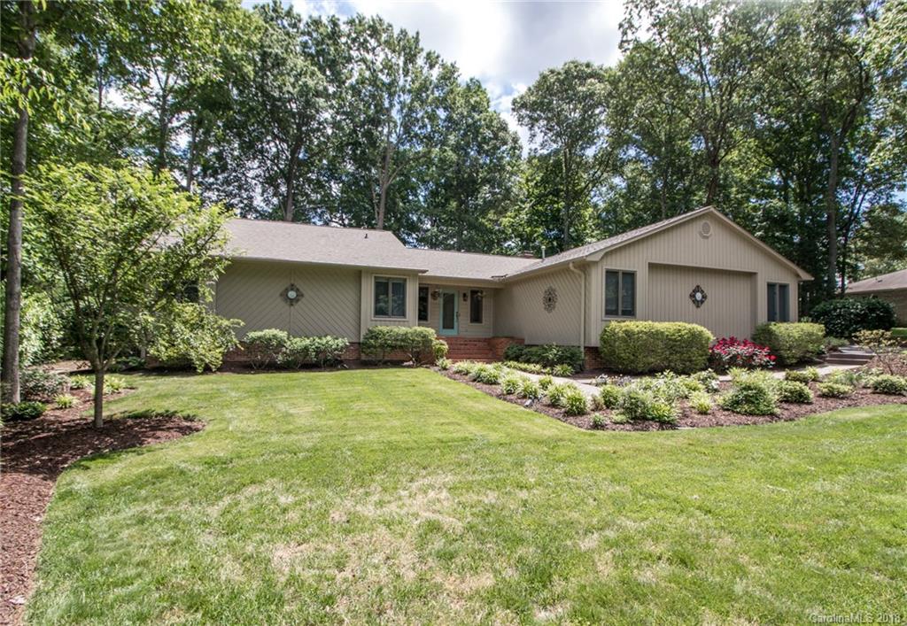 Custom home on the 14th fairway of Mallard Head golf course.  A spacious foyer leads to a great room with 2 sided brick fireplace w/wood storage.  2 sets of double doors lead to the huge deck.  Kitchen features leathered granite, unique cabinets, double side of brick fireplace, large working island, stainless appliances, and a large eating area overlooking the golf course.  Master is large w/double doors to deck. Ensuite bath w/dual sinks and leathered granite, shower, stand alone tub and double doors to outside private patio. Office has double doors leading to deck.  2 secondary bedrooms on the main-one with double closets. Newly updated hallway full bath with dual sinks, granite.  Half bath recently updated with granite. Laundry w/sink on main level. Bonus room above the master has a closet an 2 attic access doors.  Full bath up. 2 car gar has storage areas. Gorgeous backyard has a park like setting-Fenced.  Brazilian Cherry floors on most of main level. Central Vac