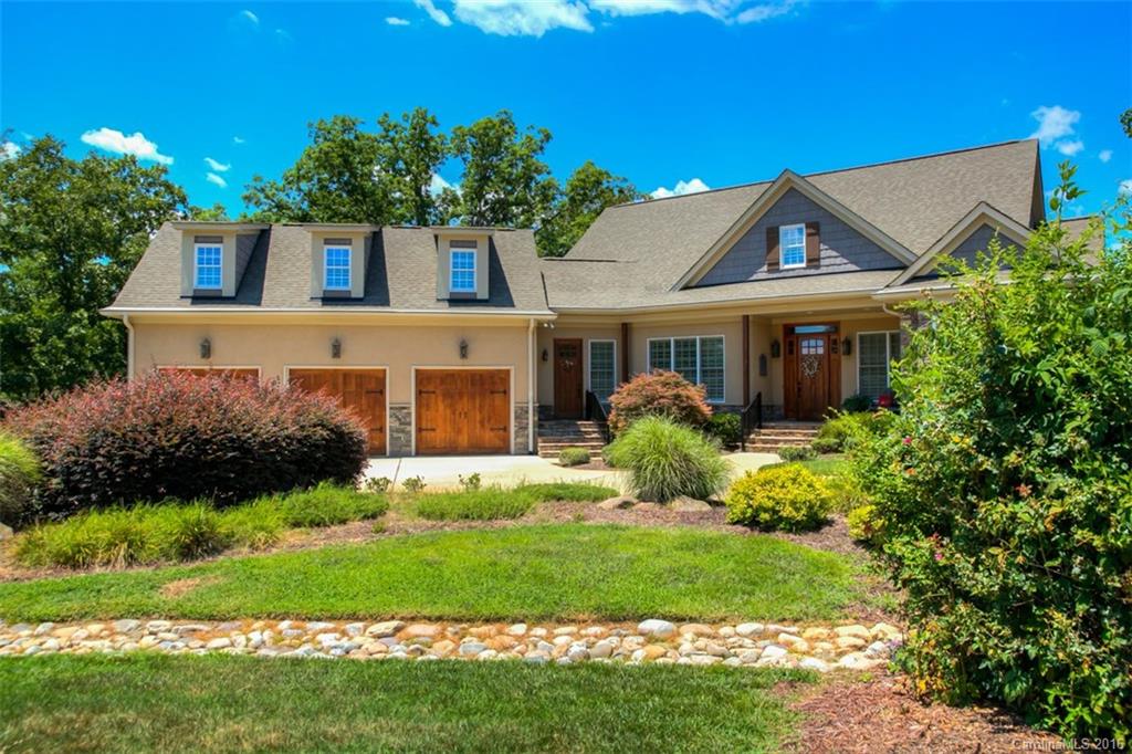 WOW!! Lake Wylie living at it's finest! Welcome home to this waterfront custom gem on a quiet cul de sac. Beautiful finishes abound throughout this home; spacious kitchen, detailed moldings, silestone, everything you would expect in a gorgeous waterfront home! All levels have wonderful outdoor areas to enjoy: screened porches, stairs down to dock looking out to the main channel! Master suite on the main level along with secondary bedroom and bath. Too much storage to detail here, must see!