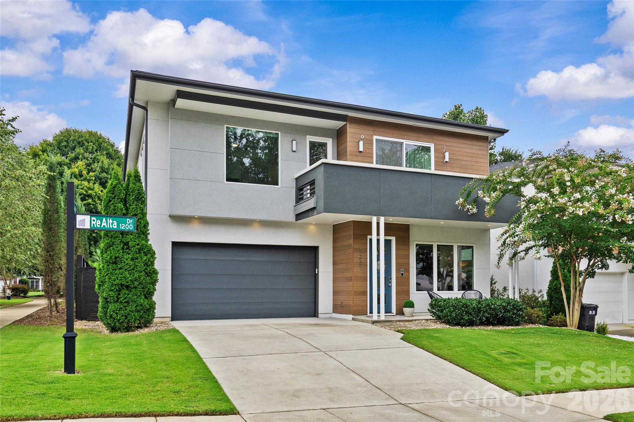 Boasting thoughtful design and high-end finishes, this home is ready to impress a buyer with an unmatched appreciation for the best that style and modern technology have to offer. As the premier solar home community in south Charlotte, this neighborhood is perfectly situated in proximity to expressways, shopping, and uptown. Within its almost 3,000 square feet of living space, 3 bedrooms, and 2.5 baths, every convenience has been considered, from the tankless water heater to the Italian cabinetry to the solar panels and the enviable low carbon footprint. Step inside and be greeted by natural light, bright spaces, high ceilings, and modern touches. The kitchen is an entertainer's dream, with its large solid surface island, pantry, stainless steel appliances, and oversized windows. Step into the backyard and enjoy this corner lot with its high wooden privacy fence, as well as a covered sitting area ideal for a good late night conversation or a hot morning coffee. Take the staircase to the second floor and find three bedrooms and a media/bonus room, all finished with the same attention to detail and functionality. The primary bedroom possesses an oversized frameless glass shower, dual vanity, and huge walk-in closet. Off the media/bonus room is a large balcony, perfect for seeing the stars or catching some rays. The neighborhood is tucked into a perfect nook in Sherwood Forest, with no thru traffic and enviable privacy, as well as an excellent, close-knit community. The finished two-car garage--with its storage shelving and high ceilings--offers even more practical consideration. This home is a perfect blend of style and function, ideal for the most sophisticated buyer.