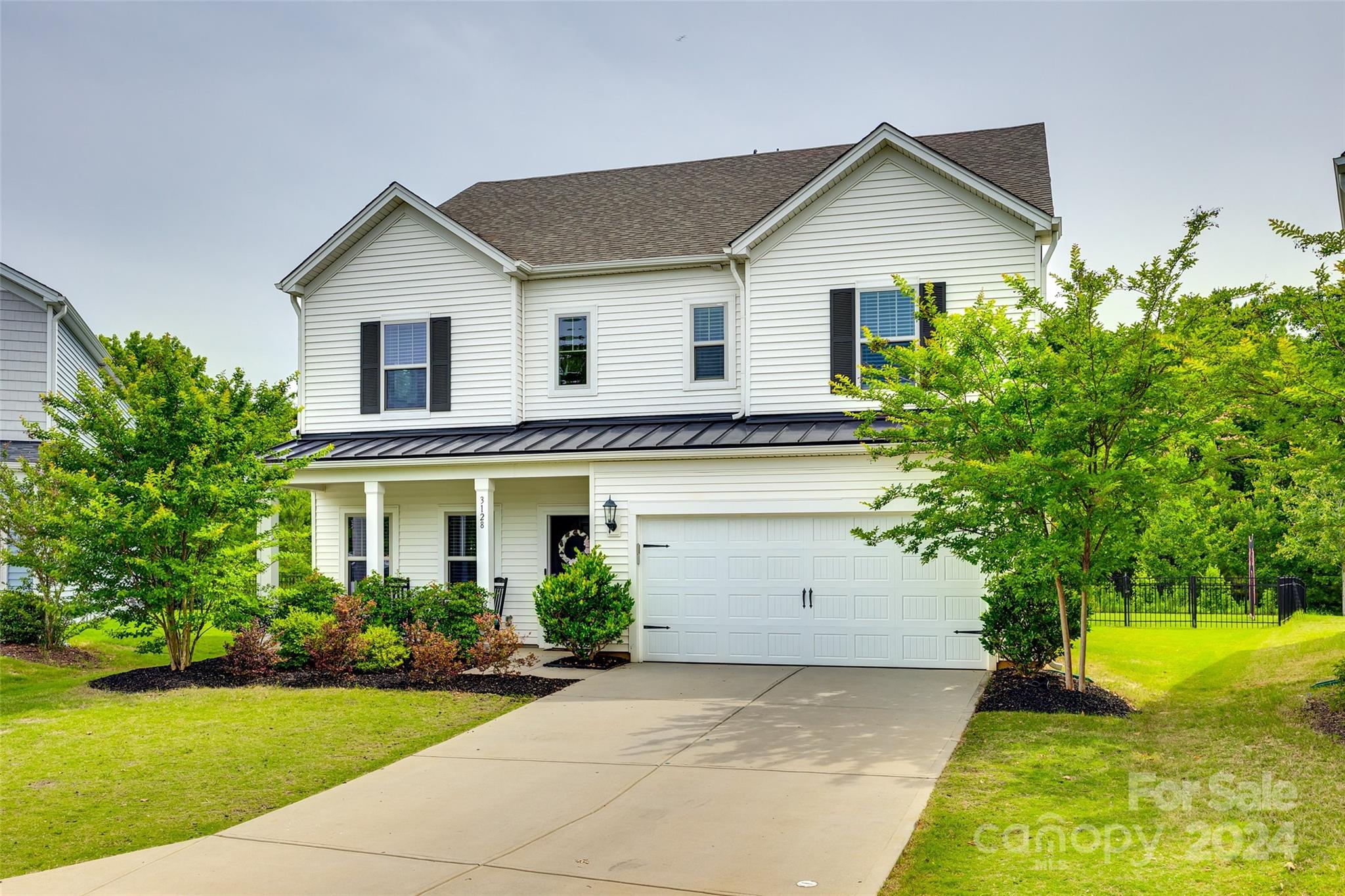 Rare opportunity to make this one owner 2019 cul-de-sac situated build your forever home! Located in desirable Saxon Place in Fort Mill, this house features an open-floorplan with five spacious bedrooms, three full bathrooms, and ample storage throughout. Tons of natural light floods the freshly painted home, which draws you out to the large level and fully fenced backyard. The kitchen features a spacious island, gas range, dry bar, and walk in pantry. The large, yet cozy, great room includes a fireplace with gas logs. The stairs lead directly to a generous loft surrounded by the primary suite, three additional bedrooms, and generous laundry room. This home was built with sustainability in mind and includes a high efficiency HVAC system with a whole home MERV 13 air filtration system. Close to dining, shops, schools, and much more. Don’t miss out on this well-built and generously sized home in a fantastic location.