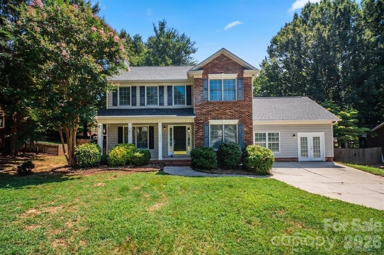 Nestled in the heart of Harrisburg, this freshly painted move-in ready home has so much to offer! Restaurants, grocery stores, parks, farmers markets and so much more within walking distance while Harrisburg Park, Harrisburg Town Center, Concord Mills, Charlotte Motor Speedway and UNC Charlotte are all just a short drive away. This home is easy to entertain in with a large living room featuring gas log fireplace, an eat-in breakfast area, separate formal dining room and a huge flex room with built-in cabinetry that would be the perfect great room, a possible fourth bedroom or even for multi-generational living with its separate entrance. Relax on the rear deck shaded by mature trees overlooking an over-sized flat private backyard that is fully fenced in - the perfect place for recreation and entertainment. Upstairs features three bedrooms and two full baths with a master suite that has separate shower and tub and spacious closet. Laminate flooring throughout the home for easy maintenance free living. Book your showing today because this one will not last!