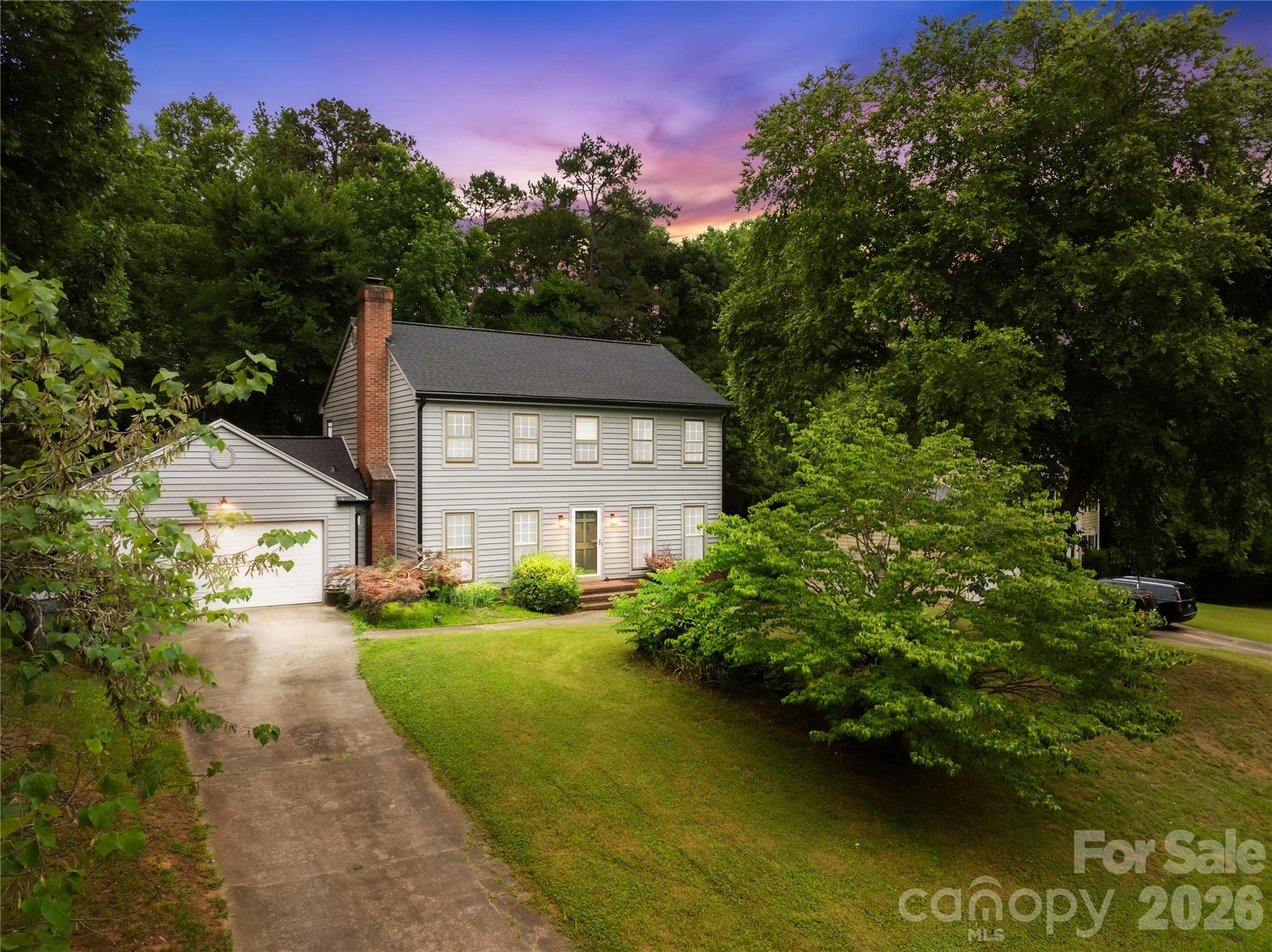 Welcome to this 3-bedroom, 2.5-bath home located in Charlotte, NC! A new roof and new insulated siding was installed in 2025 with a 50 Year transferrable warranty. Water Heater is 5 years old. Two separate living room areas encompass the downstairs, providing plenty of room for gathering, and relaxing. New carpet, and flooring just installed throughout the home. An additional flex area offers a space that can be used as a home office, playroom, workout space, or hobby room. The kitchen offers ample cabinet and counter space, making meal preparation and entertaining a breeze. Stepping outside, you will find a fenced-in backyard, perfect for pets, outdoor activities, and private entertaining. The attached two-car garage provides convenience and extra storage space. Home sits on the Mallard Creek Greenway.  Downtown Charlotte is less than 20 minutes away, Charlotte Douglas International Airport is 20 minutes away, and minutes away from I-85 and I-485.
