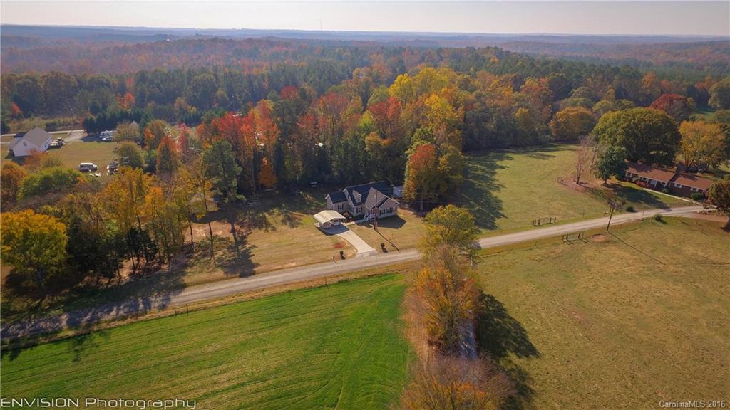 Wake up to the morning mist and the clucking of hens roaming over 1.14 acres of tree-lined land. Pour yourself a cup of coffee in the open kitchen and listen to the sounds of silence from your deck. Later in the day, tend to your garden or work that classic car in the double detached garage. Upgrades and updates galore, all you have to do is move in!