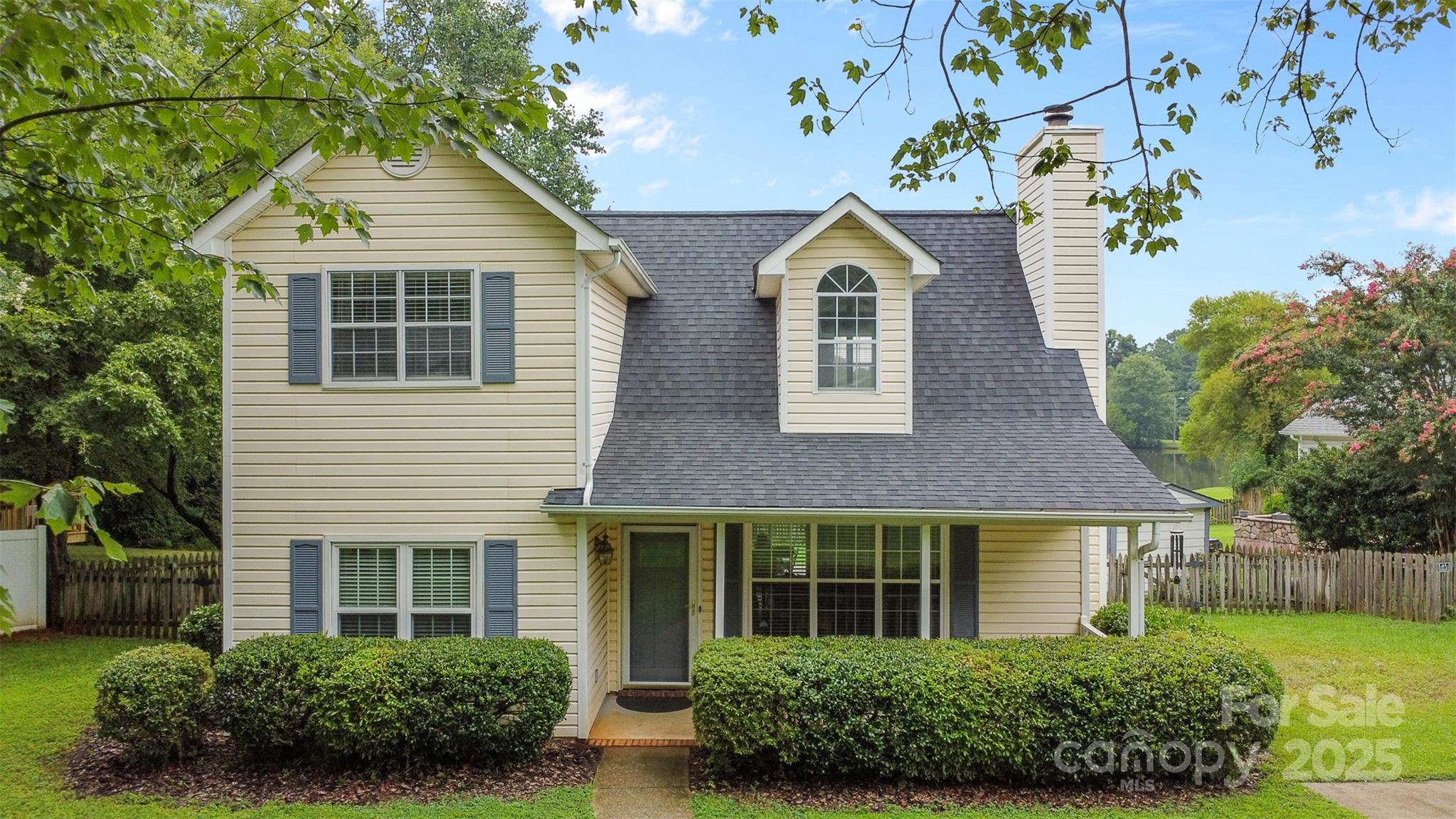 Tucked in the heart of Charlotte’s sought-after Martin Lakes neighborhood, this charming 3-bedroom, 2-bath home offers perfect blend of comfort, convenience, and natural beauty. From the moment you walk in, you're greeted by a vaulted ceiling in the great room creating an open, airy feel. A wood burning fireplace ideal for curling up in winter months. The primary bedroom suite on the main floor offers privacy and ease, while upstairs, you’ll find two generously sized bedrooms, a full bath, and a spacious loft—perfect for a home office, gym, or hangout space. Step outside to enjoy the peaceful pond, ideal for fishing, or nature watching. The HVAC and water heater were replaced in 2023, offering peace of mind for years to come. Martin Lakes is known for its picturesque walking trails and lakes, all just minutes from shopping, dining, and major commuter routes. This home is a true gem—don't miss your chance to live where comfort meets convenience and nature is right outside your door!